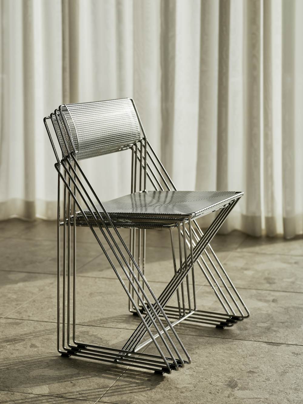 X Line Chair in Chrome stacked