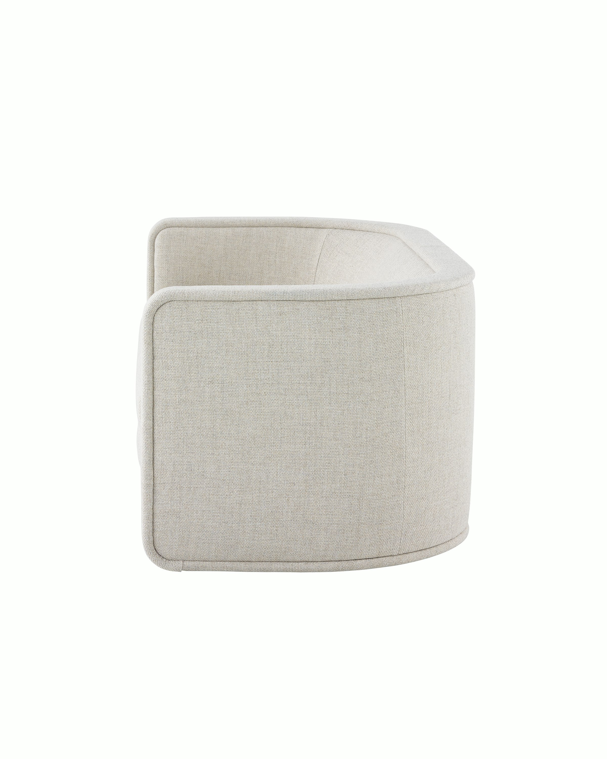 A U-Series Settee upholstered in a light neutral fabric.