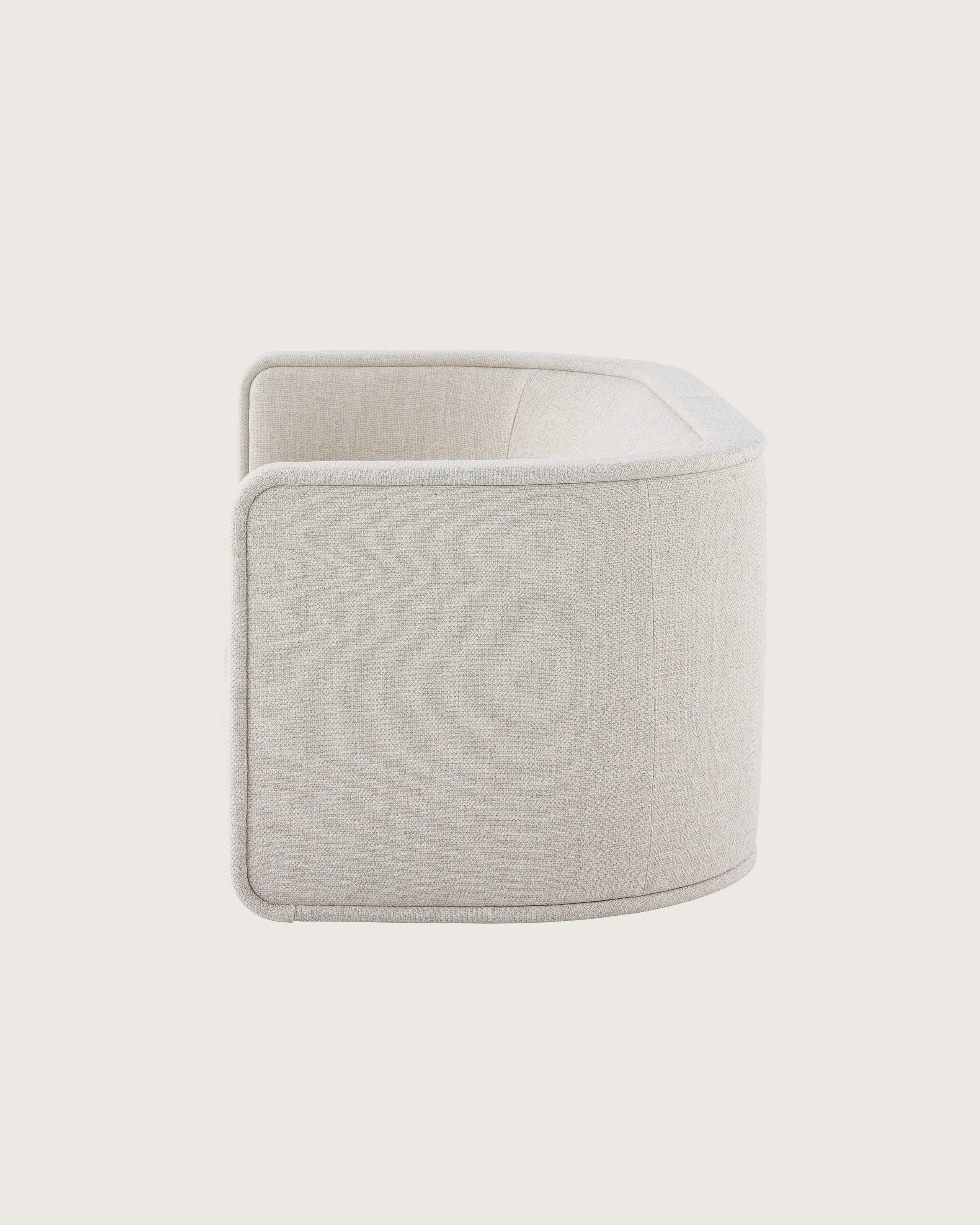 A U-Series Settee upholstered in a light neutral fabric.