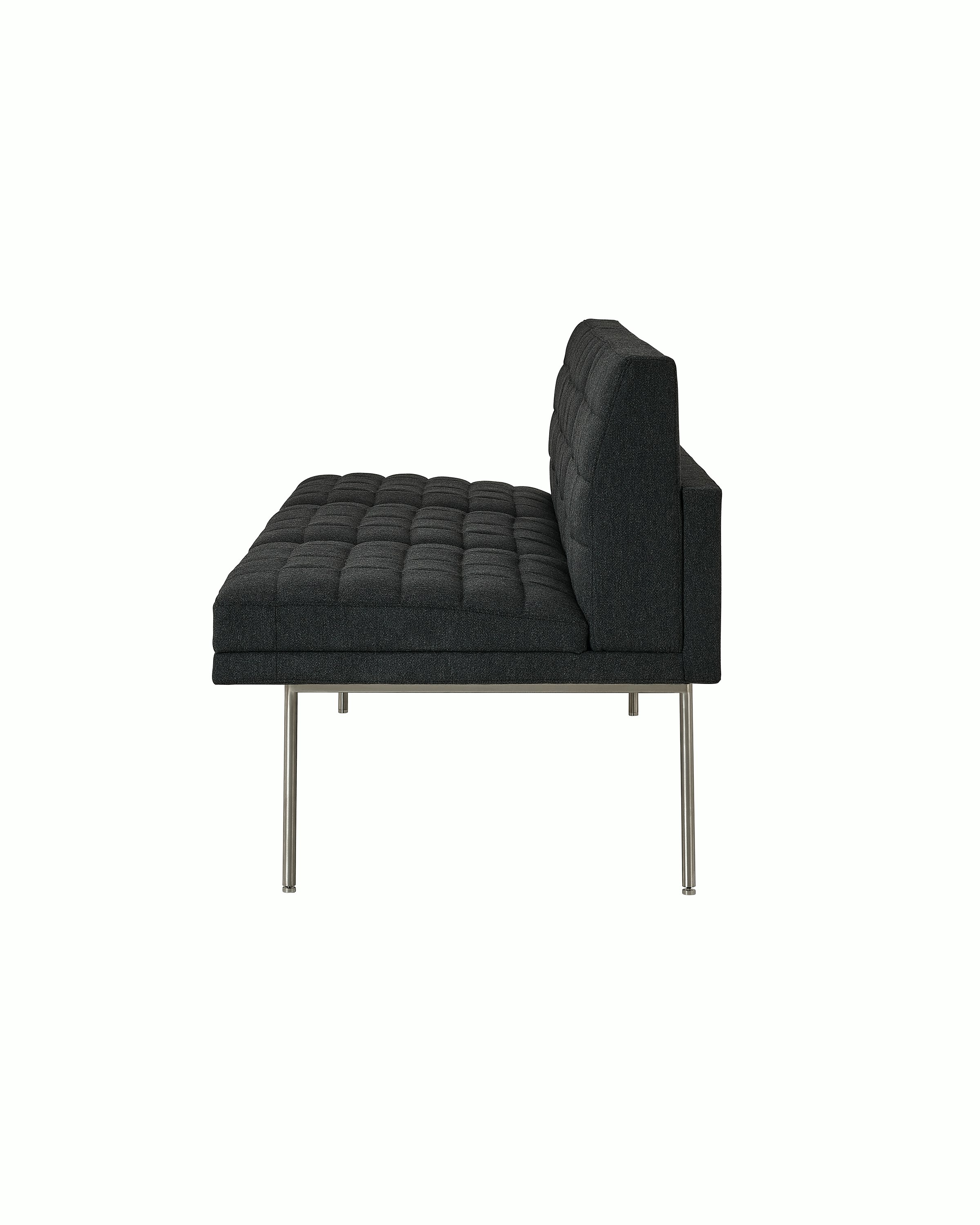 Tuxedo Component Sofa designed by BassamFellows upholstered in Bellano in Charcoal with a polished chrome base, shown in profile on a white sweep.