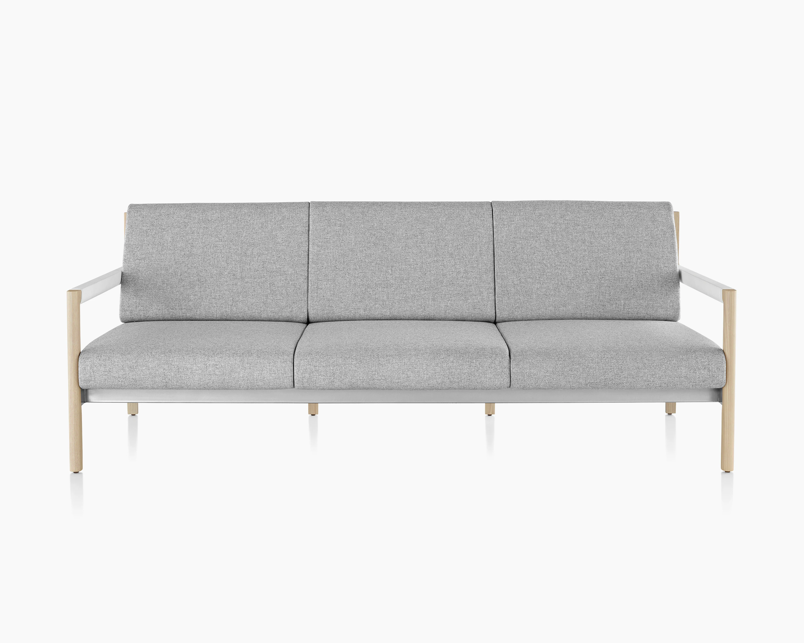 A Brabo sofa with Clare light gray upholstery, white leather-wrapped arms, metal accents, and a light wood frame, viewed from the front.