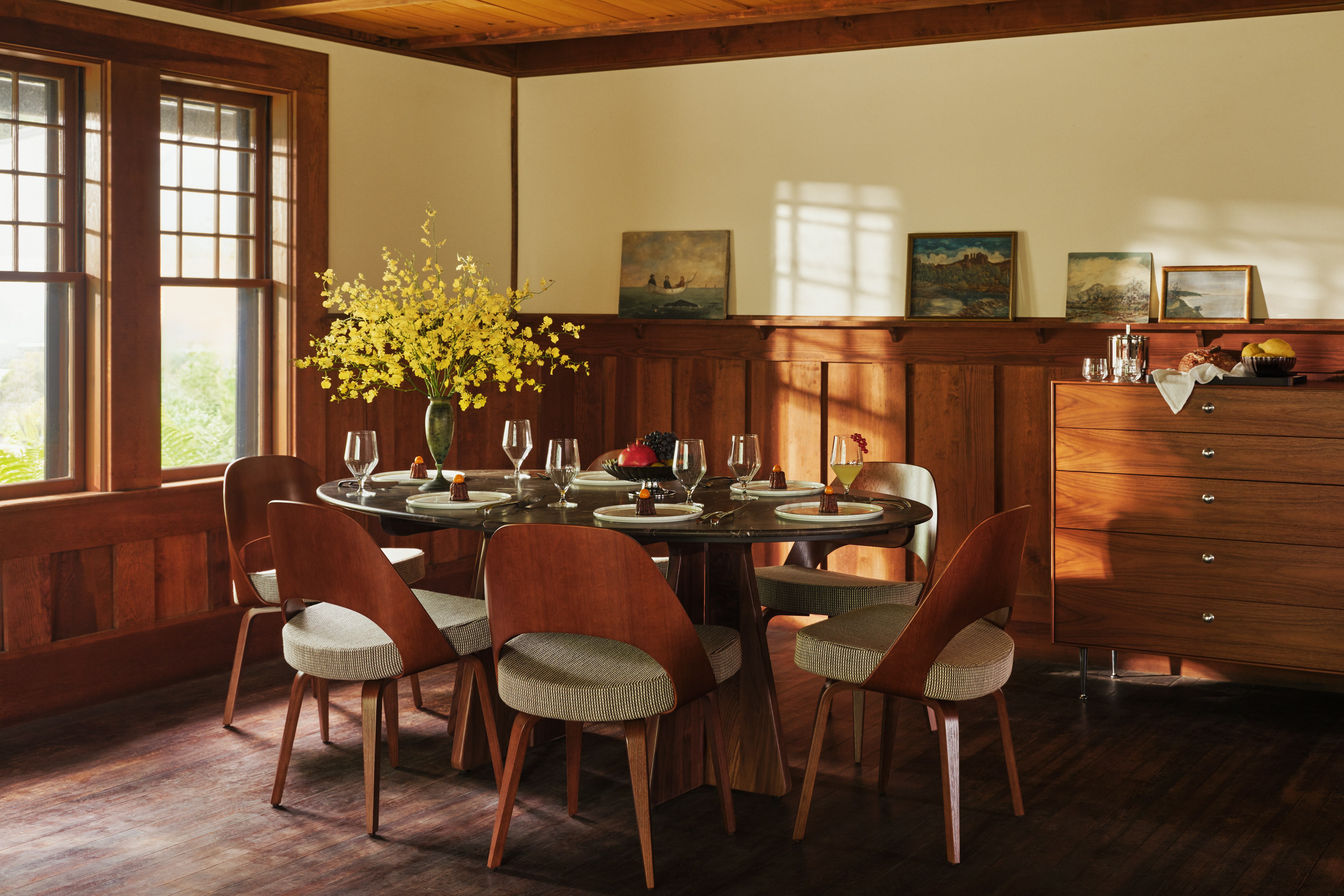 Pinna Dining Table in espresso with Saarinen Veneer Back Chair in a dining room