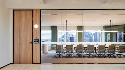 Exterior looking into a large meeting room with Setu Chairs.