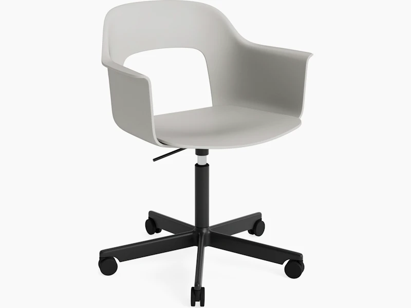 Layout Armchair light grey polypropylene arm shell and seat on black aluminum 5-star base with casters, front angled view.