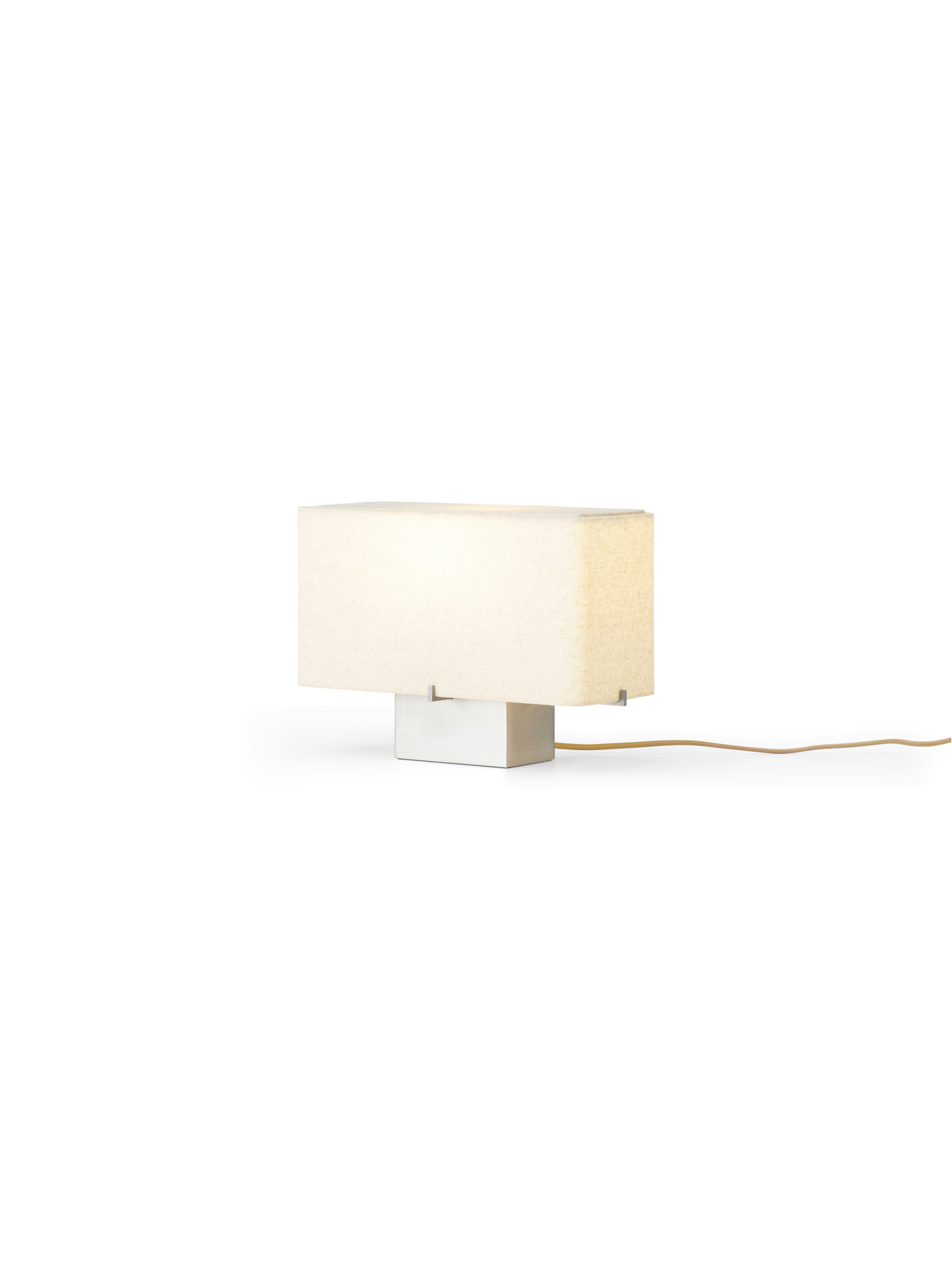 A Nonna Aluminum Table Lamp  viewed from the front.