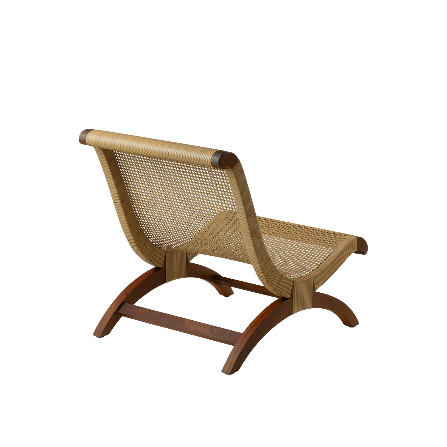 A Butaque Clasica Outdoor Lounge Chair in iroko all weather cane viewed from an angle.