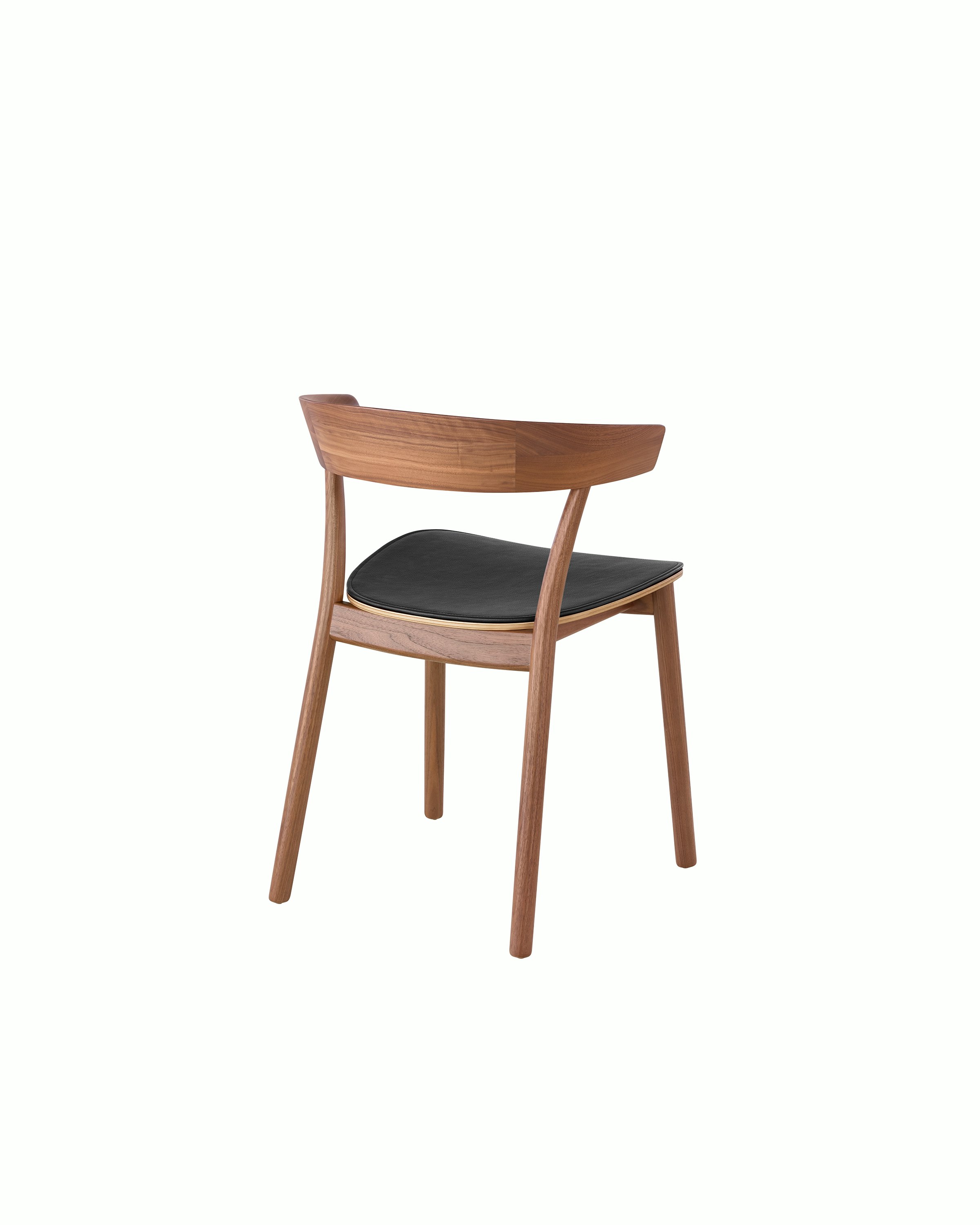A Leeway side chair with black leather seat pad and a wood frame in a medium finish, viewed from the back.