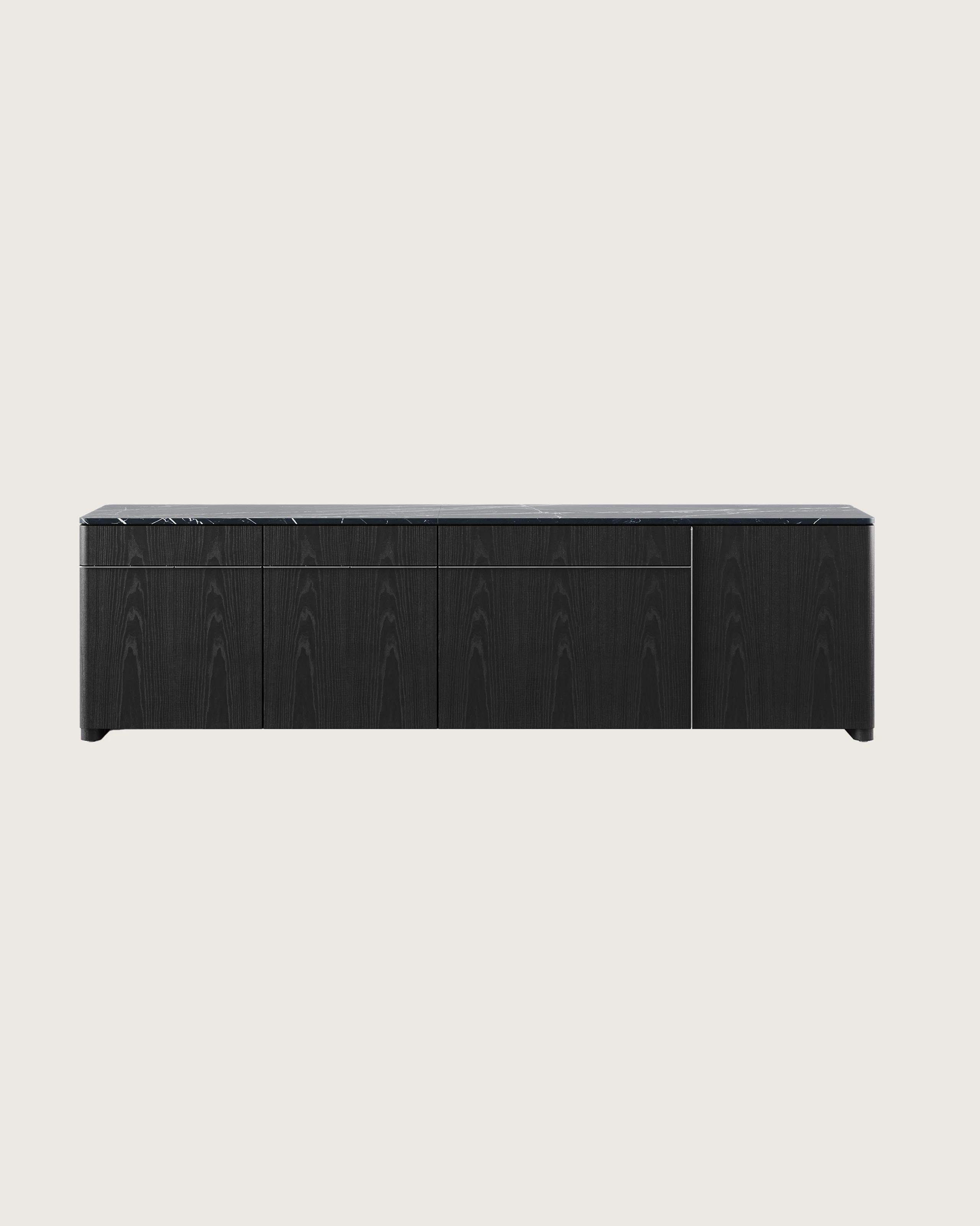 Ascent Credenza designed by EOOS in Ebonized Ash with a Nero Marquina marble top shown front-facing on a white sweep.