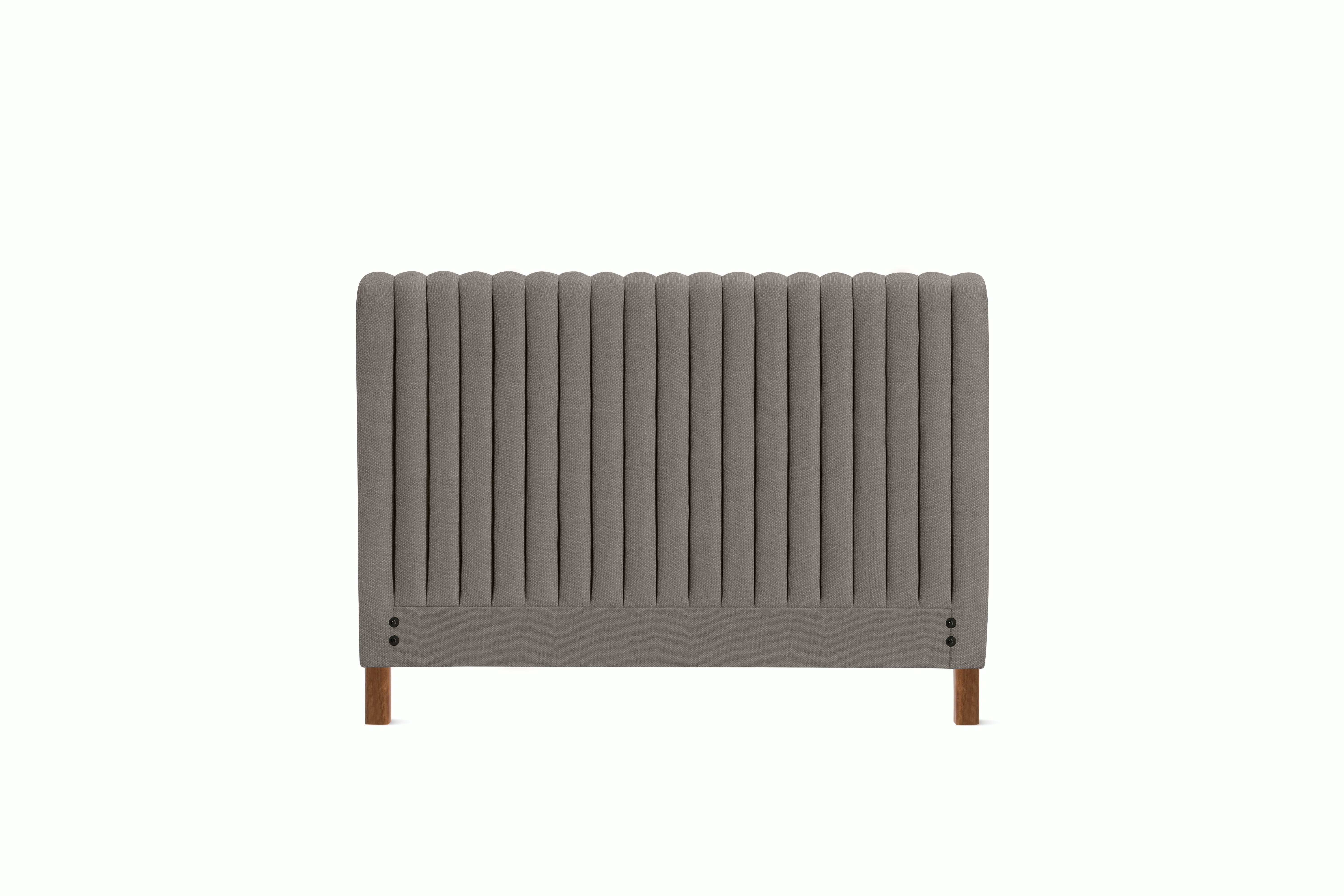 A Charlotte Headboard in Plutonic viewed from an angle.