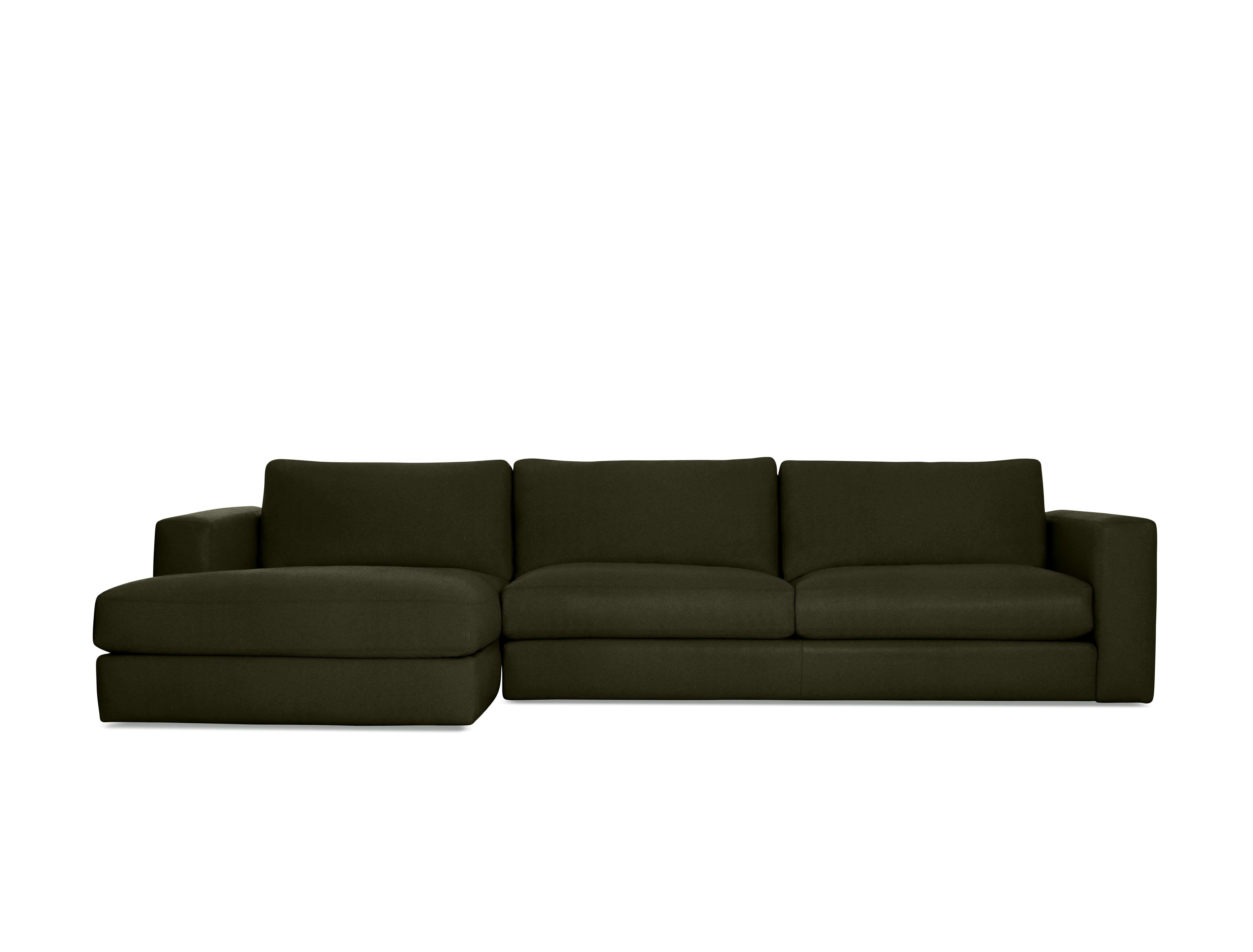 A Reid Sectional in Crypton Sintra Velvet, Olive viewed from the front.