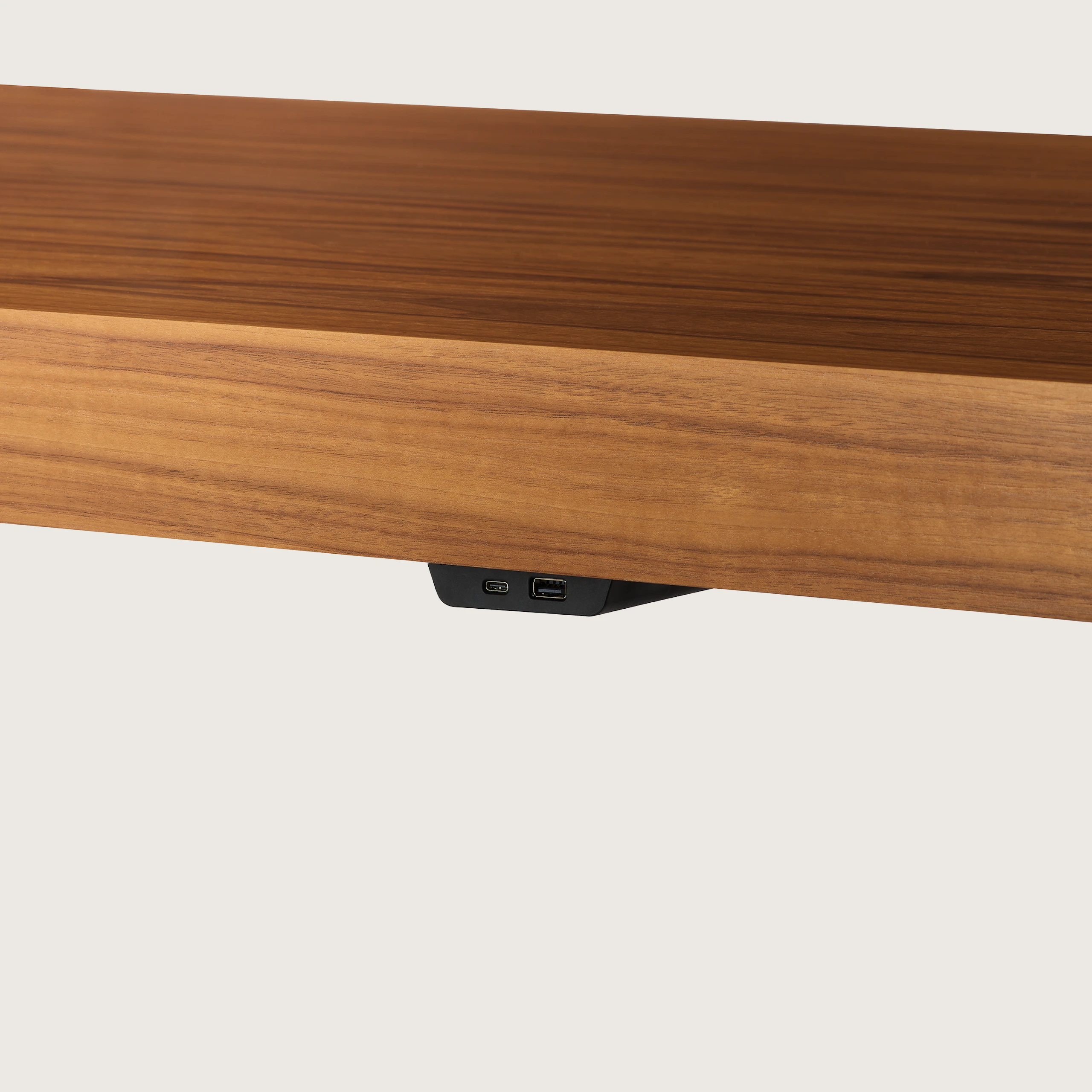 JD Waterfall Table in Walnut bar height, power detail view.
