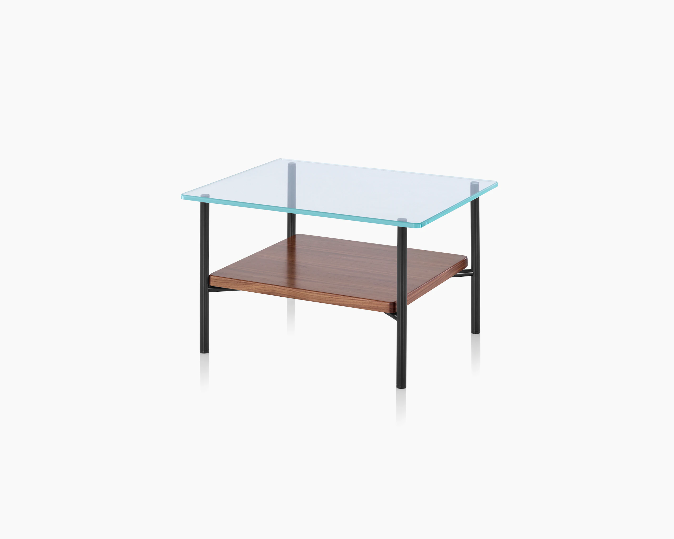 Angled view of a Layer side table with a glass top and wood lower shelf.