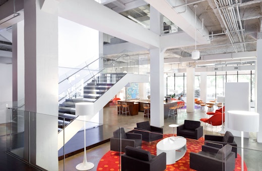 The AMU lounge is appointed with comfortable Divina Lounge and Saarinen Womb seating.