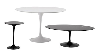 Two black and one white Knoll Saarinen Tulip Tables