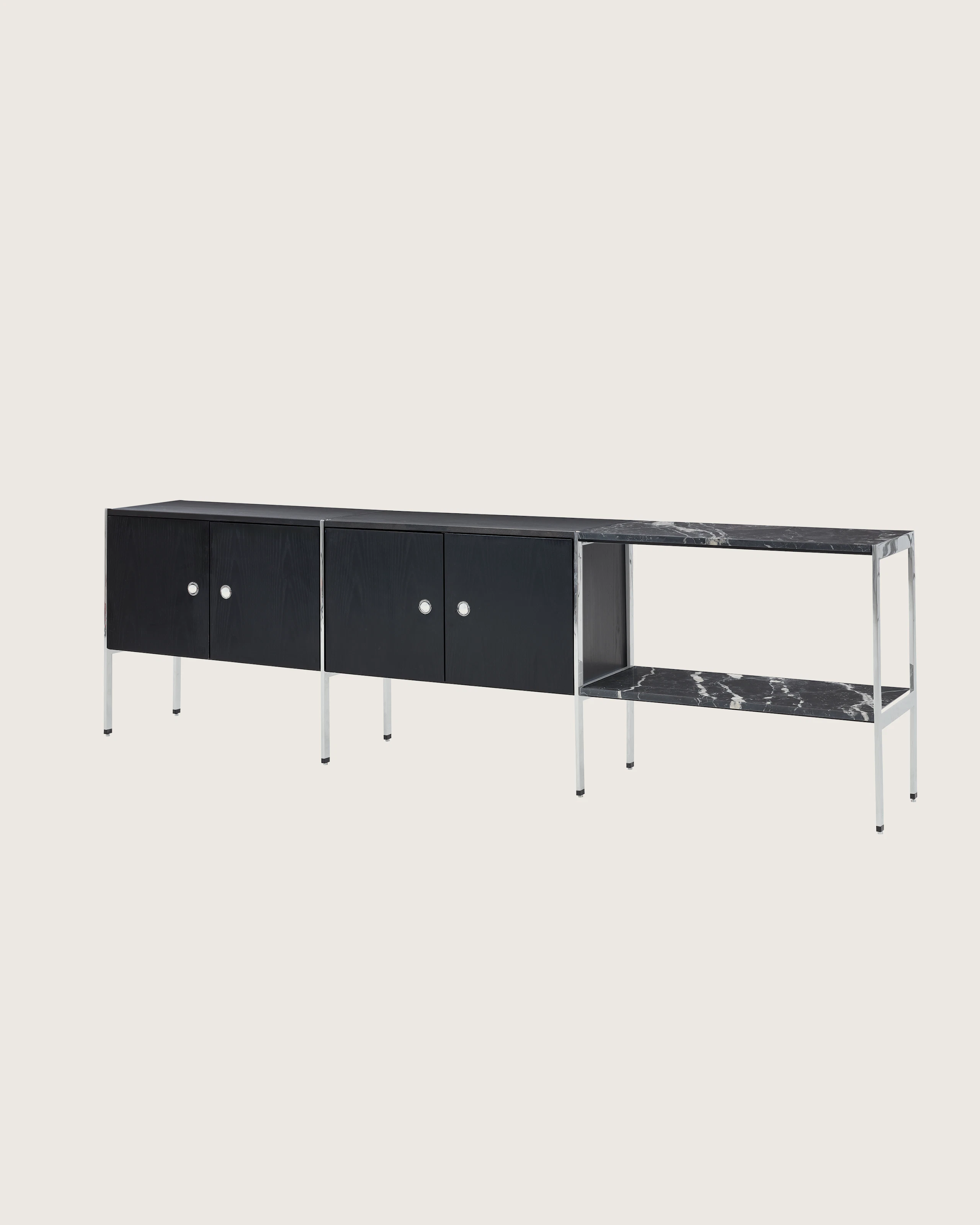 H Frame Storage designed by Ward Bennett in Ebonized Ash with a polished chrome frame and a Nero Marquina top and shelf, shown at an angle on a white sweep.