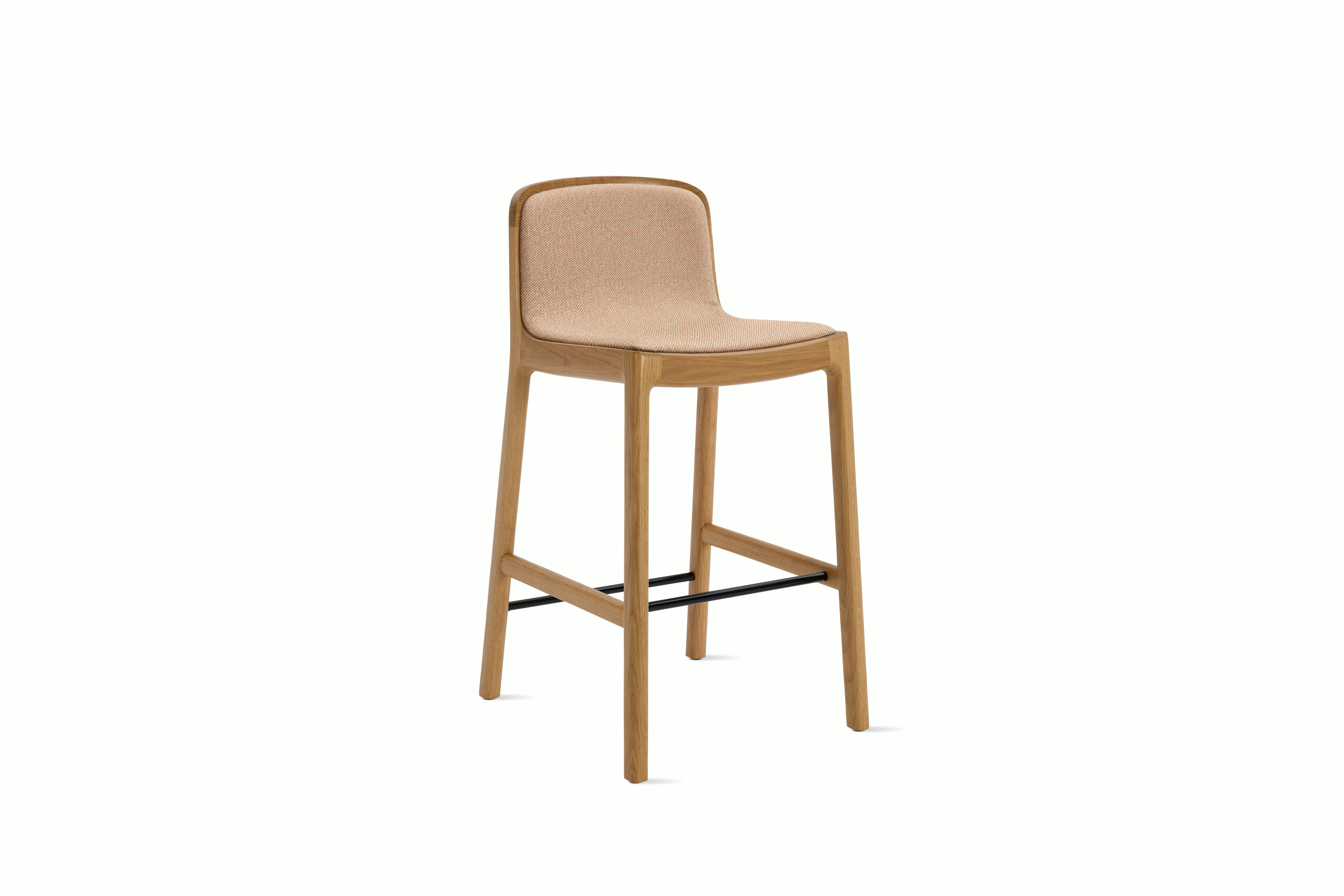 A Lijn Stool in Blush Oak viewed from an angle.