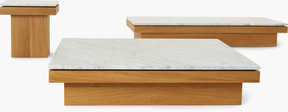 Group of two/two-tone marble-top coffee tables with wood bases