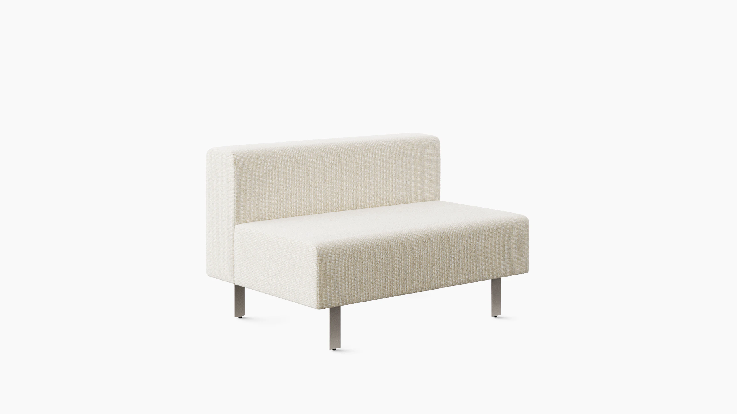 A short lounge bench with back in light colored upholstery is viewed from an angle.