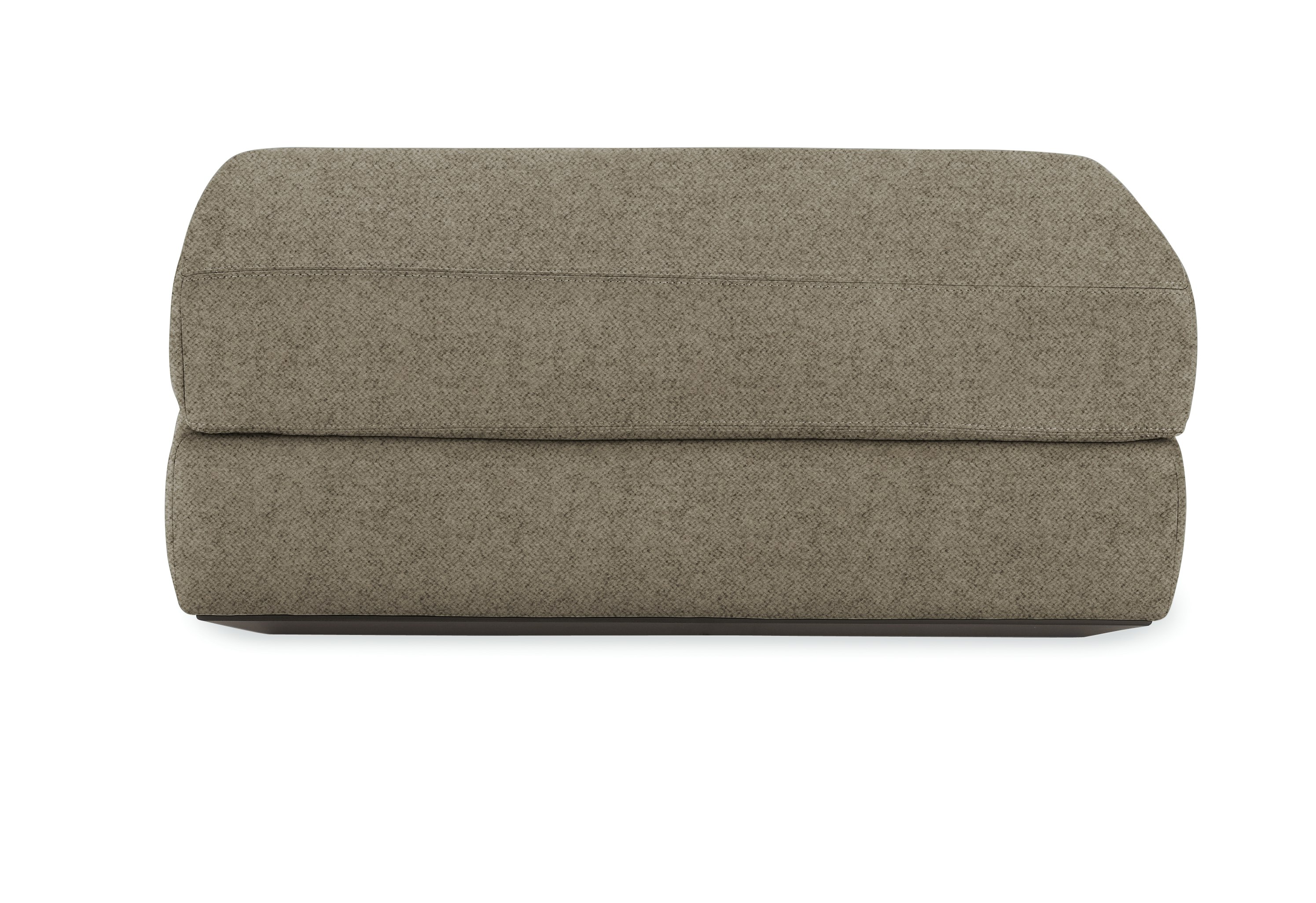 A Reid Ottoman in brown viewed from the front.