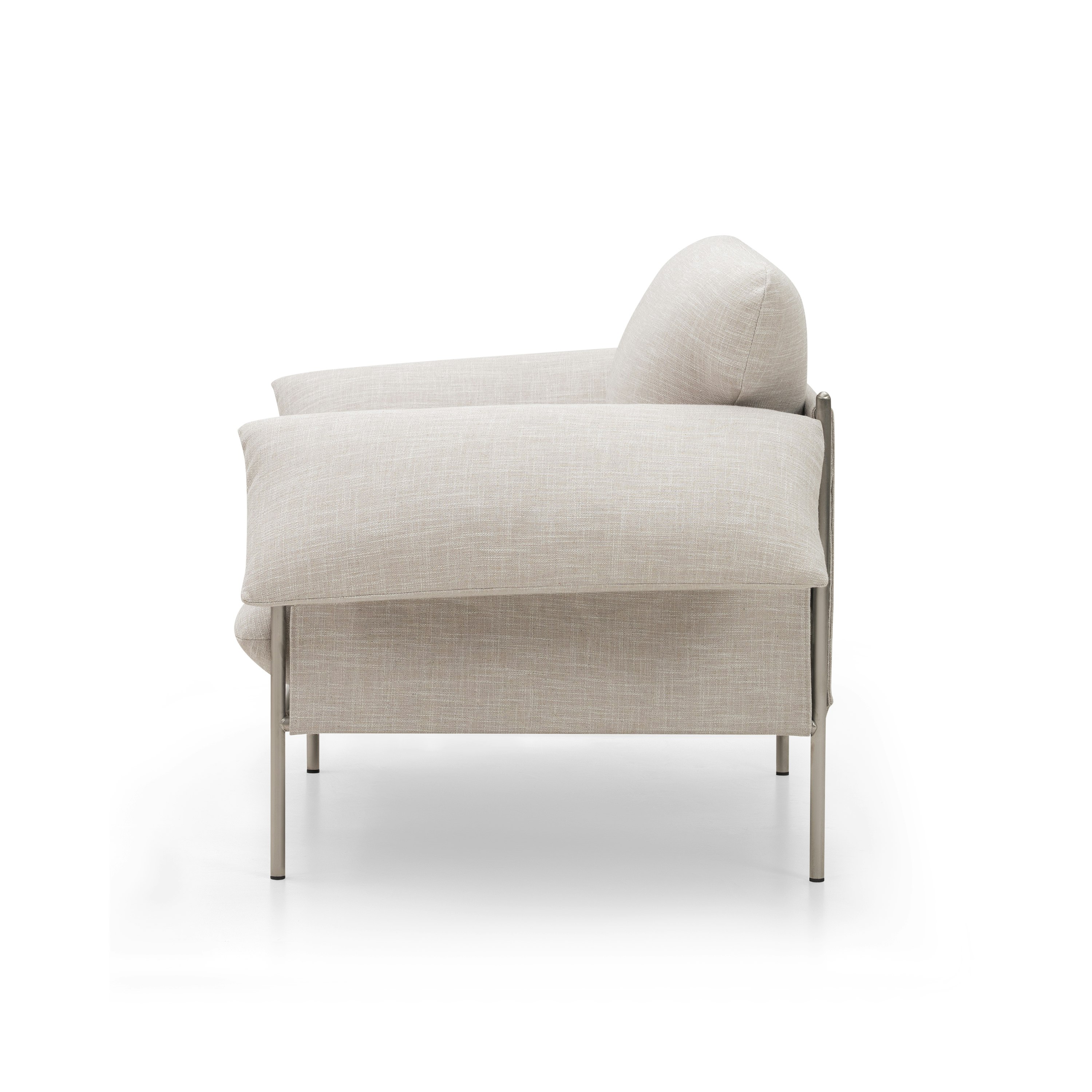 A Alva Chair in Byron Oyster with a Brushed Steel finish viewed from the side