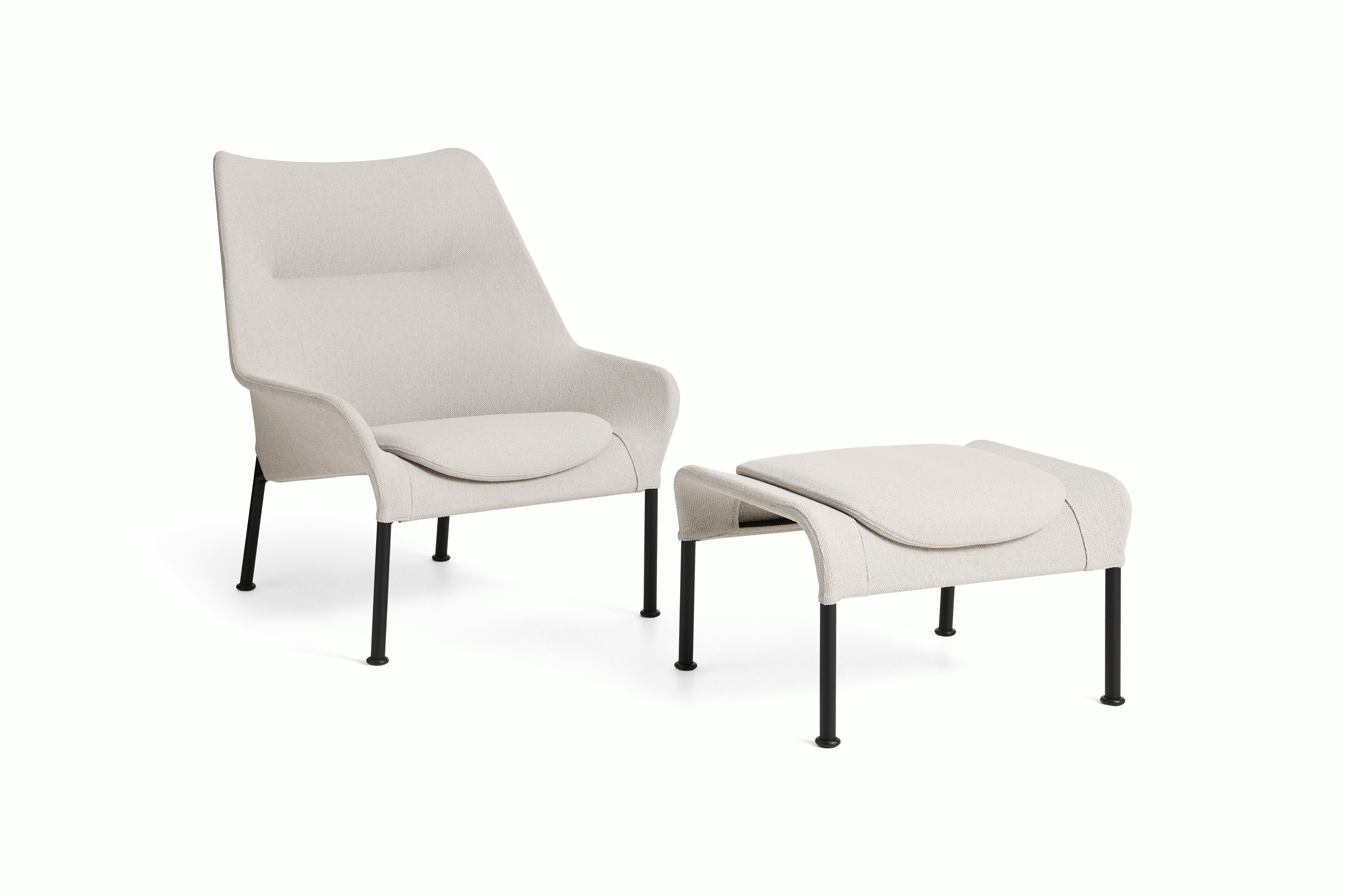 Light grey O2 Lounge Chair with black base and matching ottoman on white background.