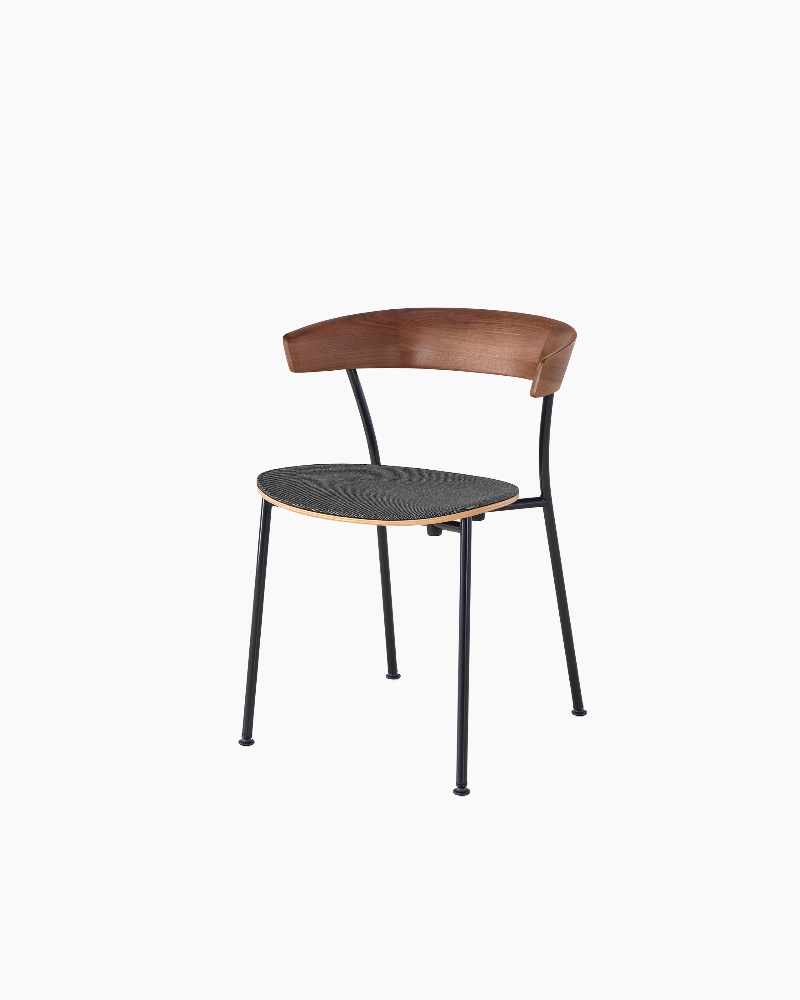 Angled view of a stackable Leeway Chair with a metal frame, curved wood backrest, and upholstered seat.