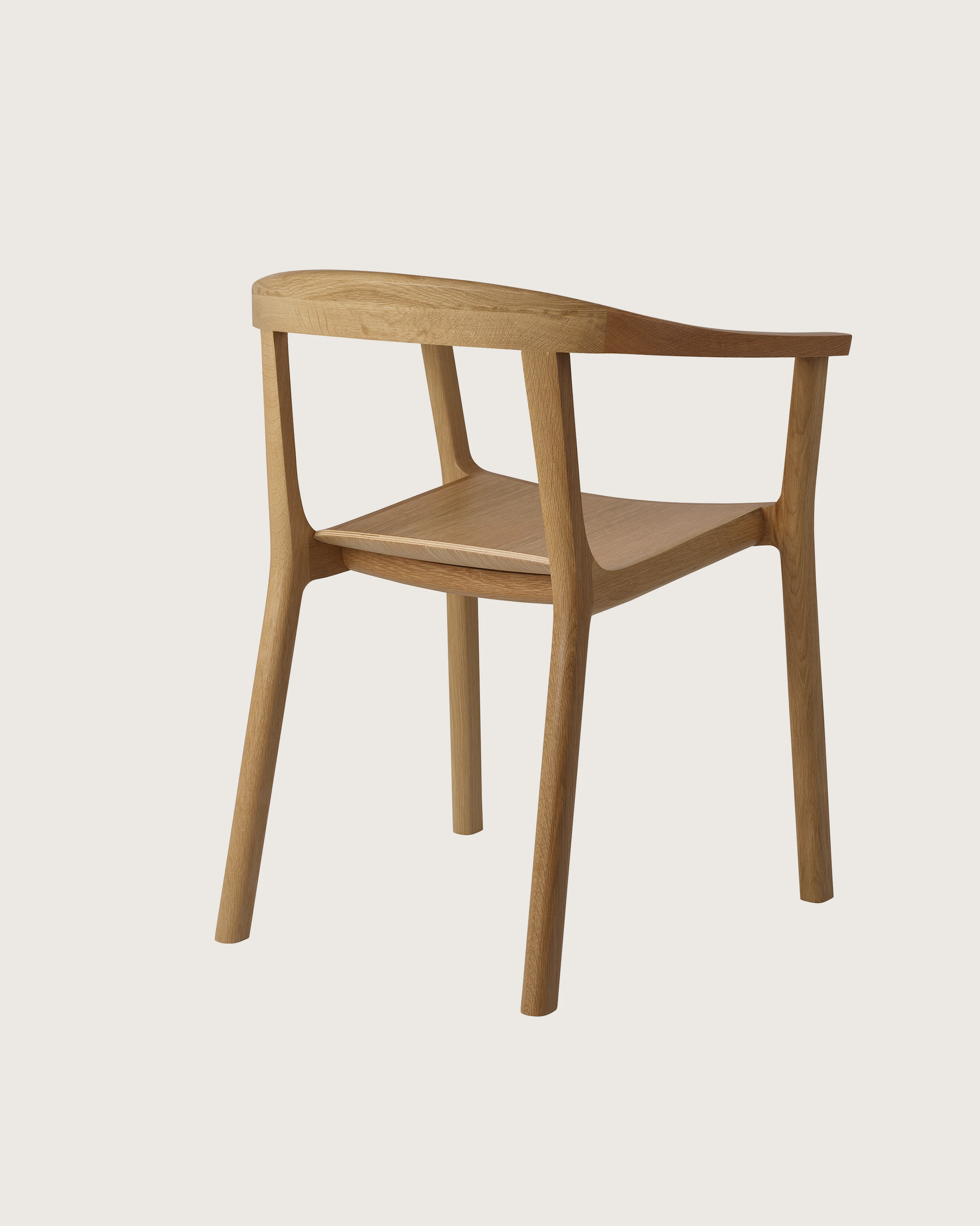Lijn Armchair by Carole Baijings for Geiger in Natural Oak frame, angled back view on a white sweep.