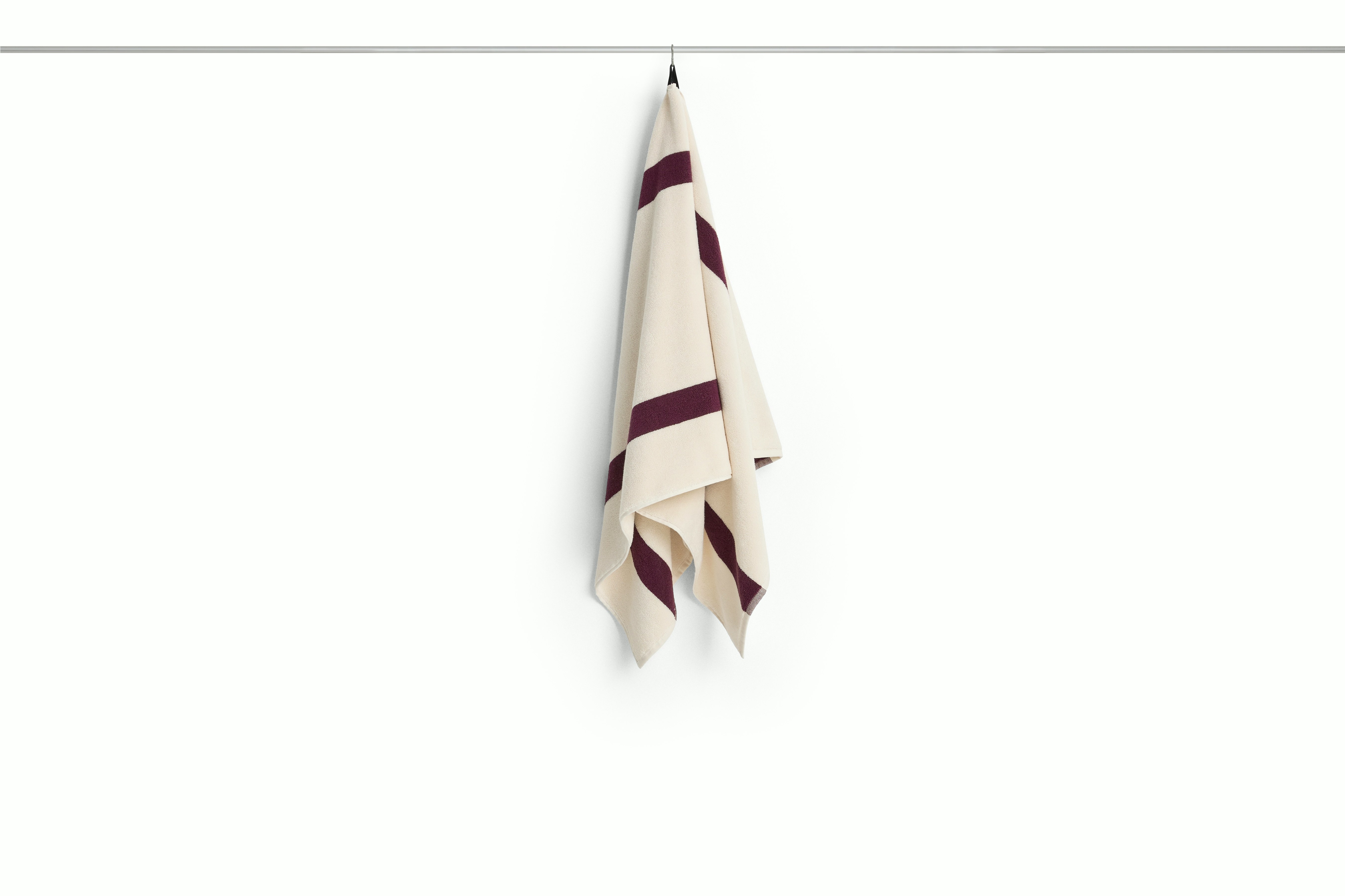 A detailed look at Stripe Bath Towel in Burgundy.