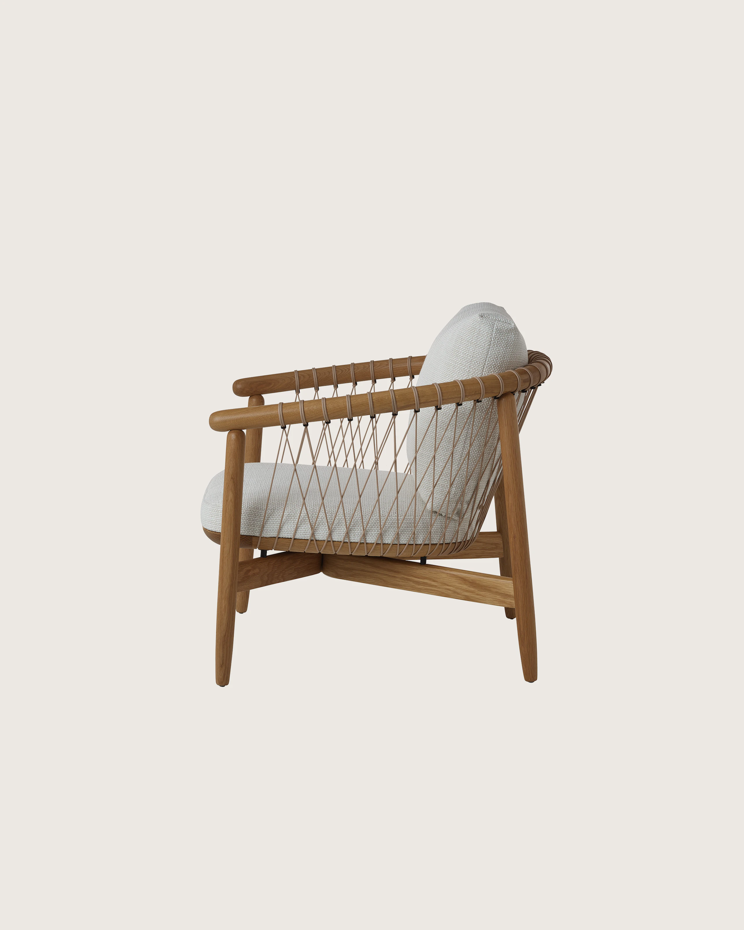 Crosshatch Lounge Chair by EOOS for Geiger, front view on a white sweep.