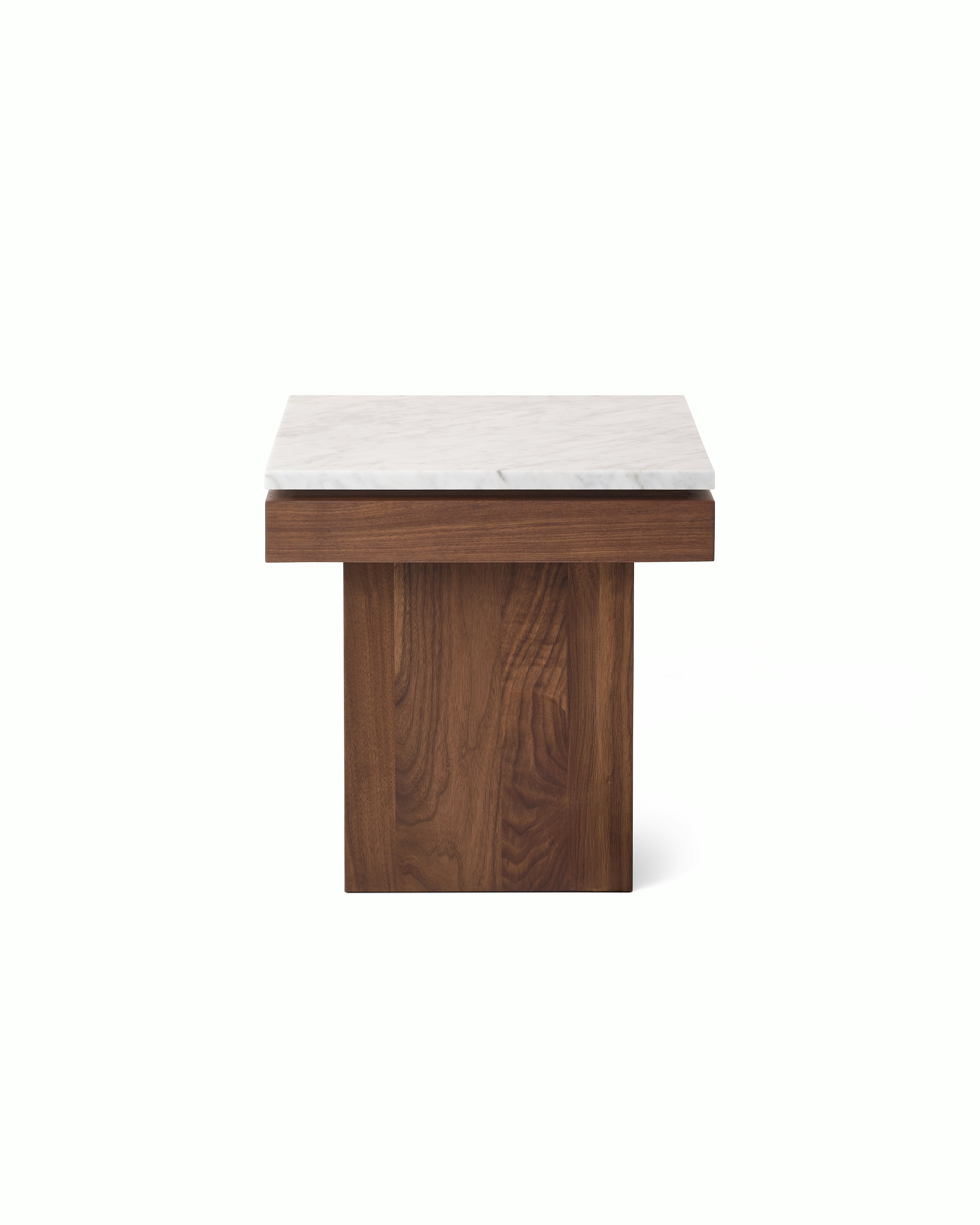 Pawson Drift Side Table with walnut base and white marble top, viewed from the front.