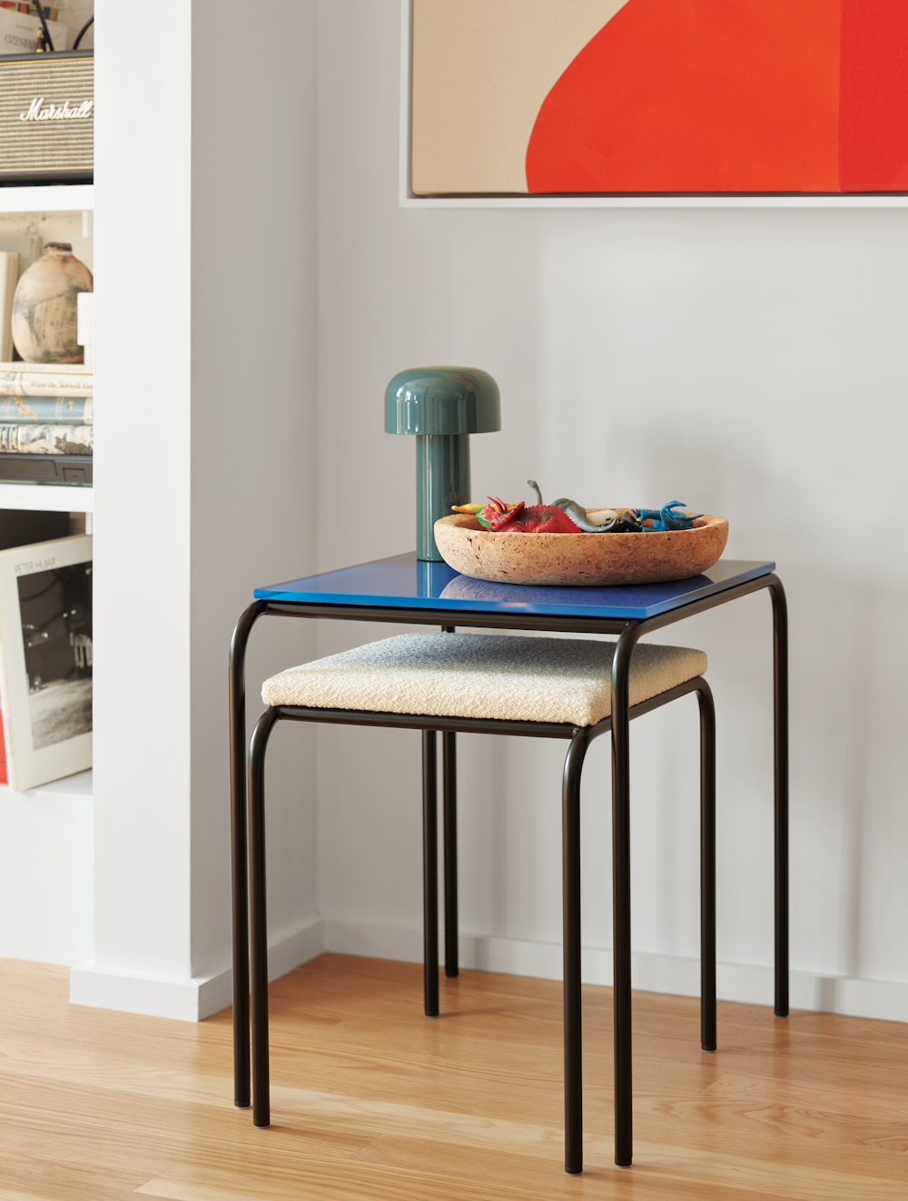 Fellow Nesting Table with Stool in a living room setting
