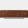 Three unit wide Domino Credenza with mixed storage in walnut with a black base viewed from the front.