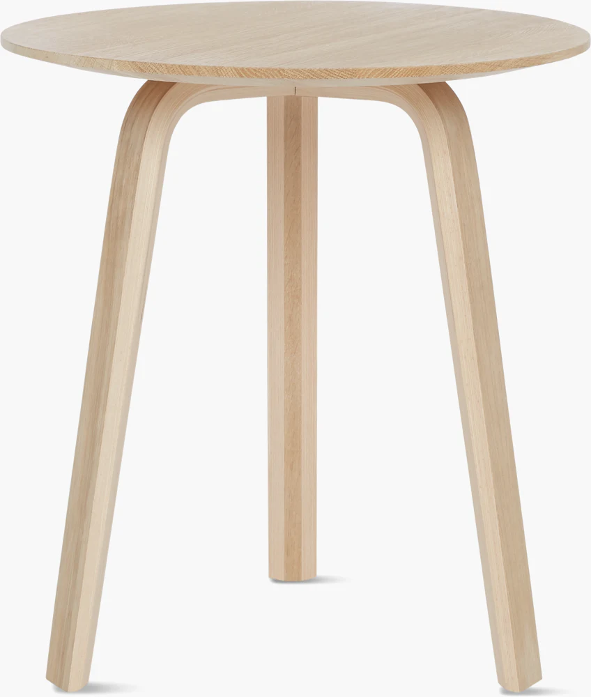 Round wooden table with tripod legs, light wood color