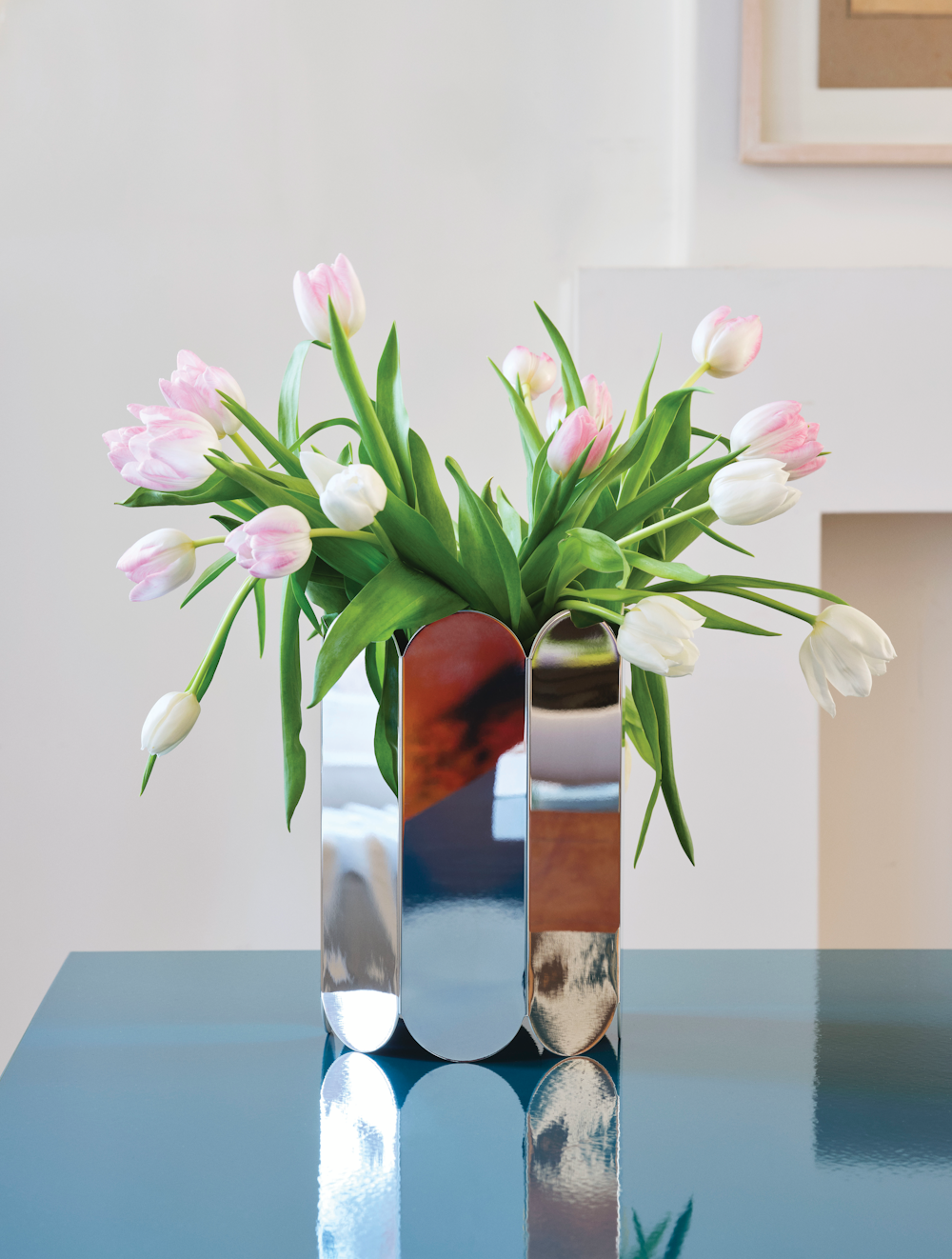Arcs Vase holding tulip flowers