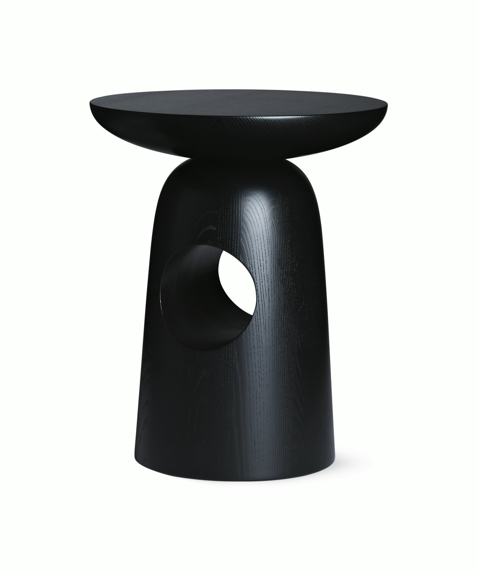 A Hew Side Table in a painted black finish.