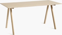 A front angle view of the Copenhague Desk in Oak.