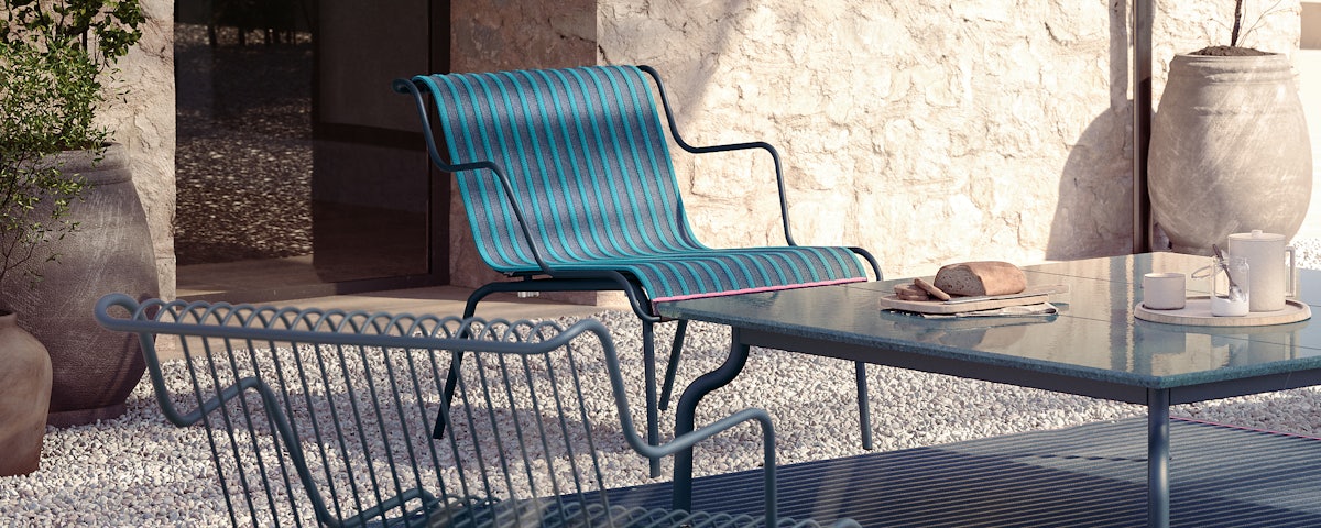 South Outdoor Lounge Chair Seat Pad on a South Outdoor Lounge Chair in an outdoor patio setting