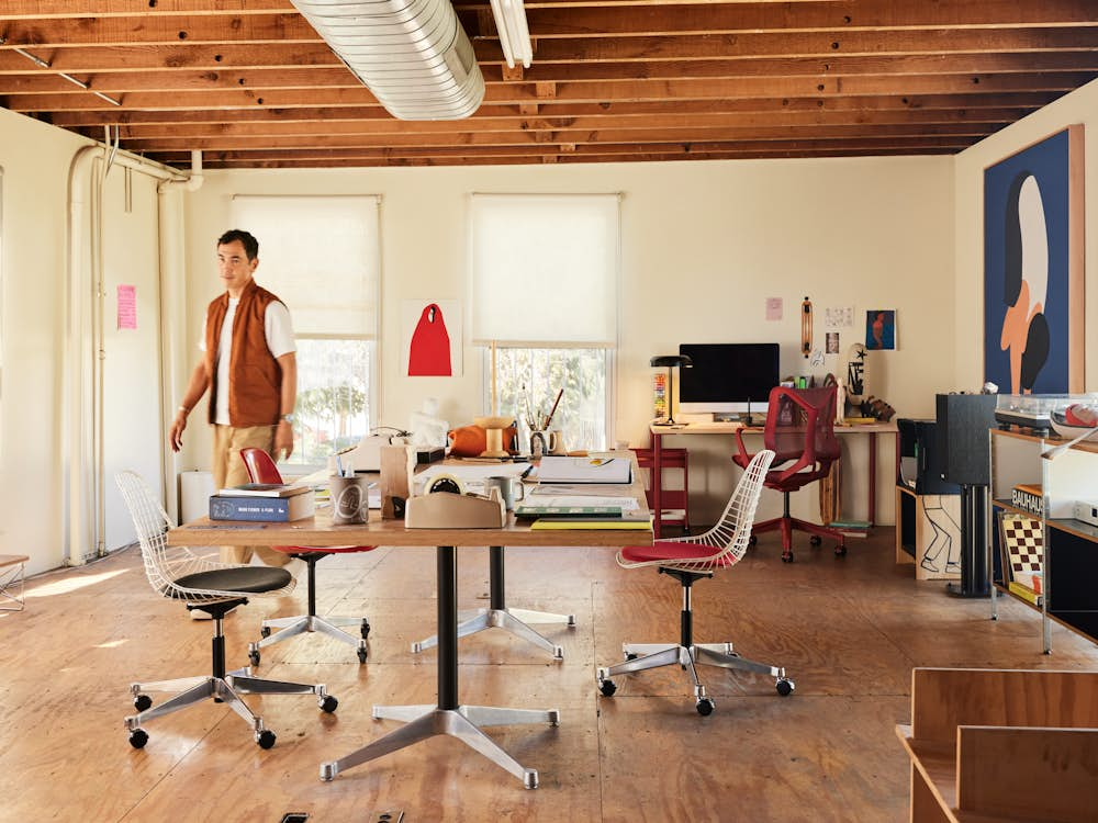 Full view of Geoff's Studio with Eames Conference Table and Eames Wire Task Side Chair