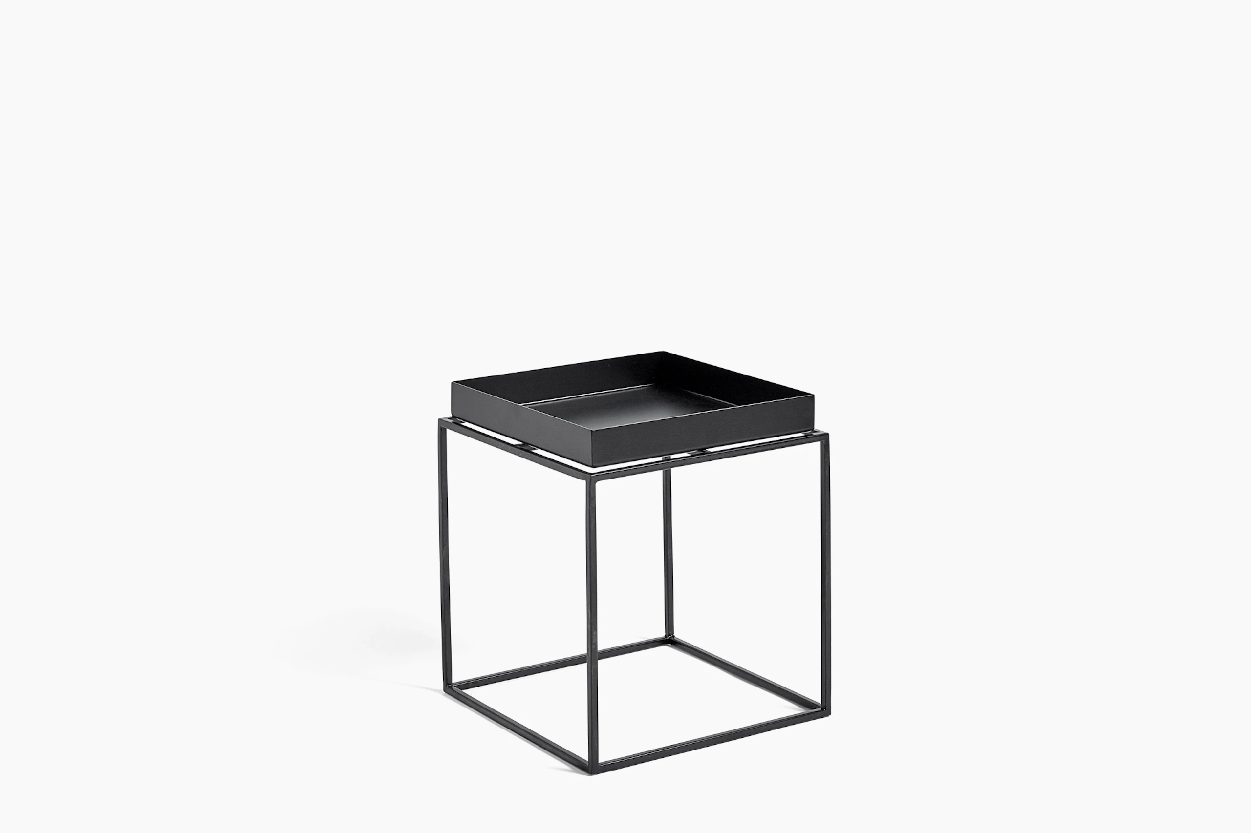 Black, square Tray Side Table, viewed at an angle.
