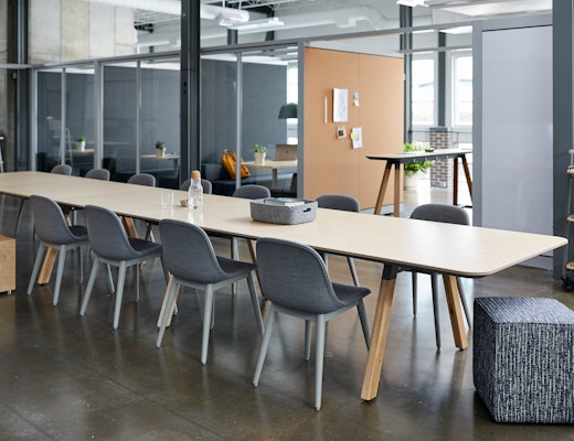 Rockwell Unscripted Community Space with Muuto rockwell unscripted library table tall table drink rail upholstered seat swivel stool creative wall filzfelt hanging panels fixed fins glass work lounge assembly community immersive open room semi enclosure muuto fiber side chair hospitality team meeting