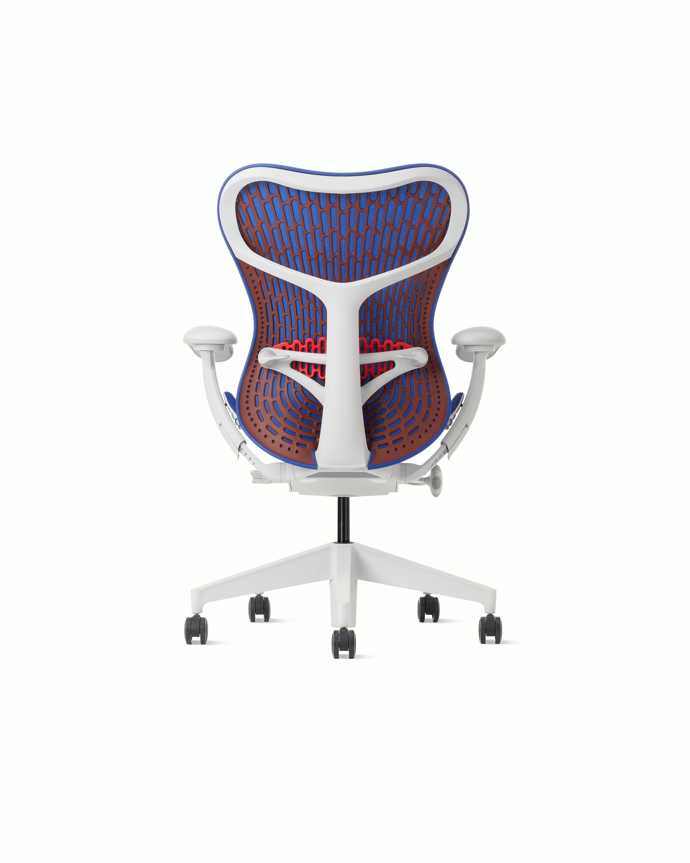 Rear view of a Mirra 2 chair with a Butterfly back in ultramarine color-block and alpine frame.