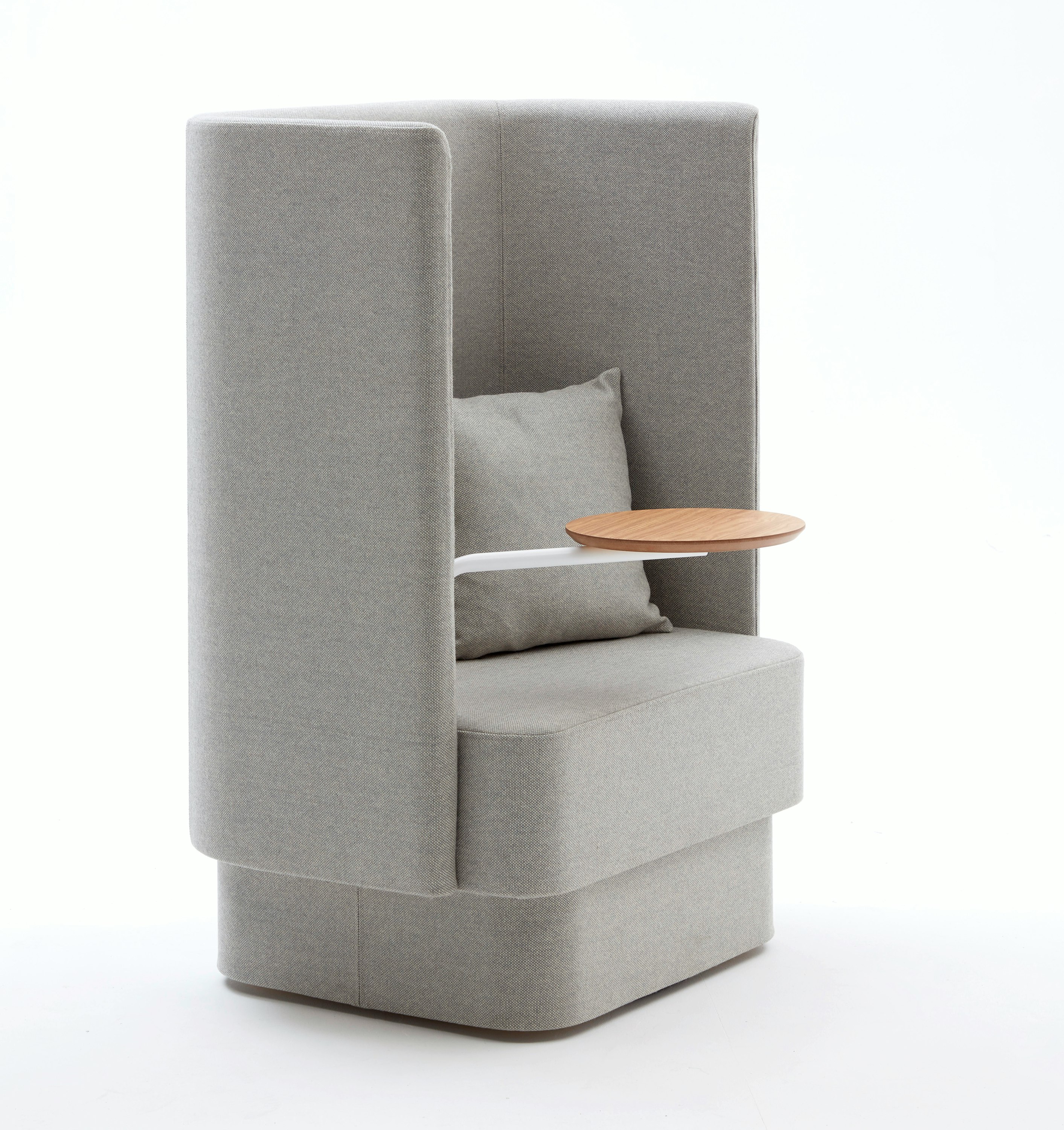 High back Pullman Chair upholstered in pale grey fabric, with fully upholstered plinth, cushion and oak veneer tablet arm.