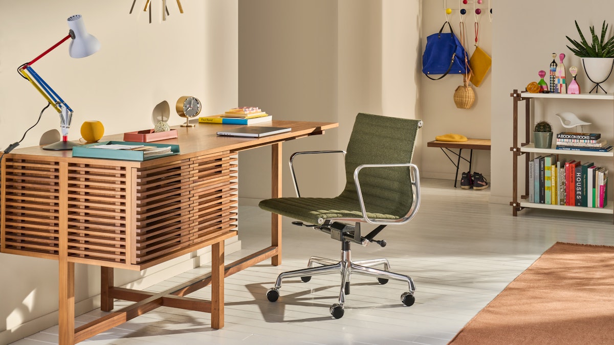 Line Desk with Eames Aluminum Group Chair in home office setting