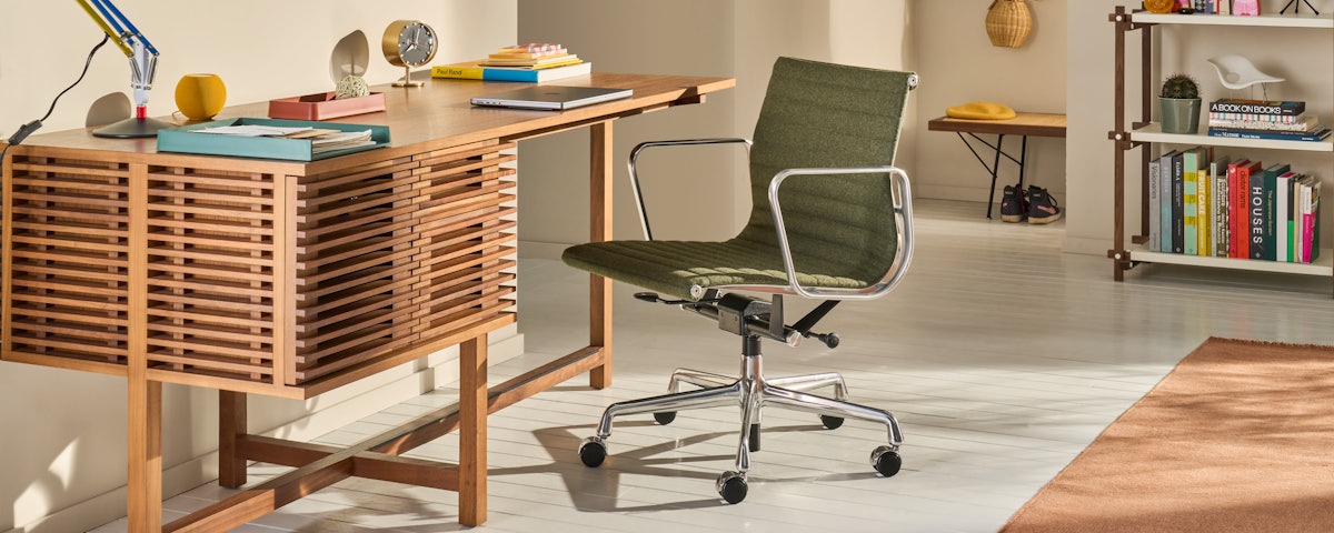 Line Desk with Eames Aluminum Group Chair in a home office setting