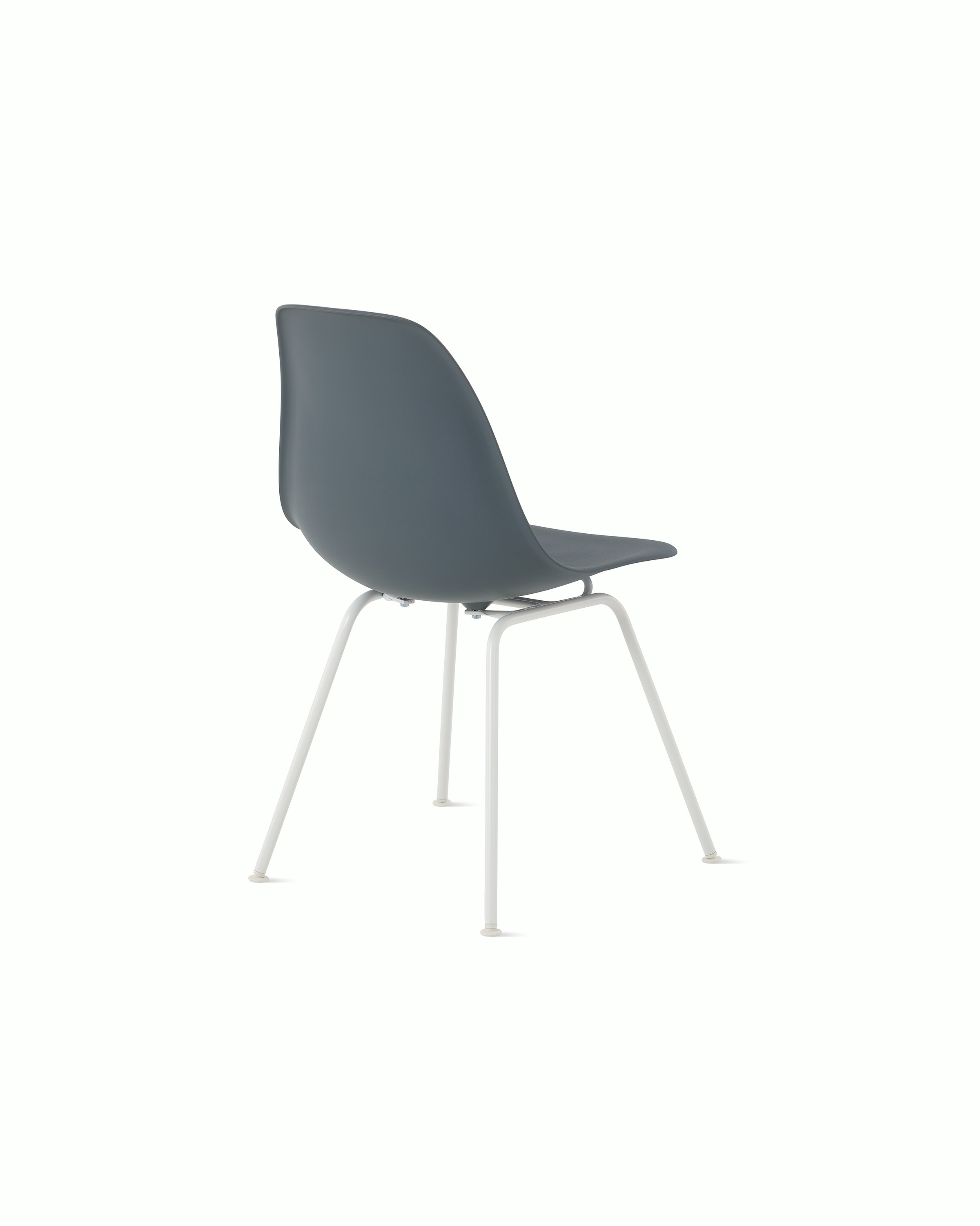 Back angle of medium grey plastic shell chair on 4-leg base.