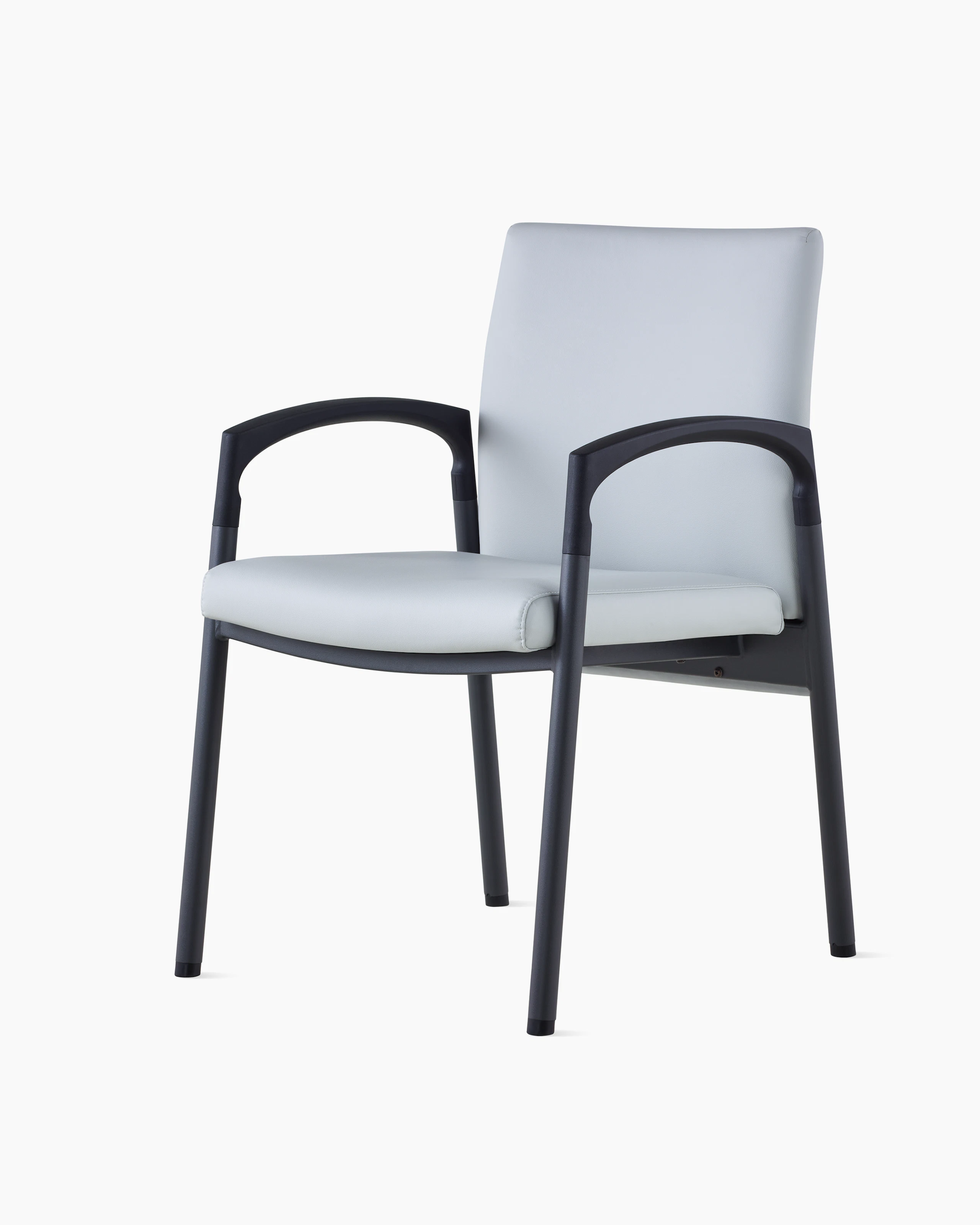 Three-quarter, left view of Valor Side Chair in a light gray upholstery on the back and seat and a black metal frame.