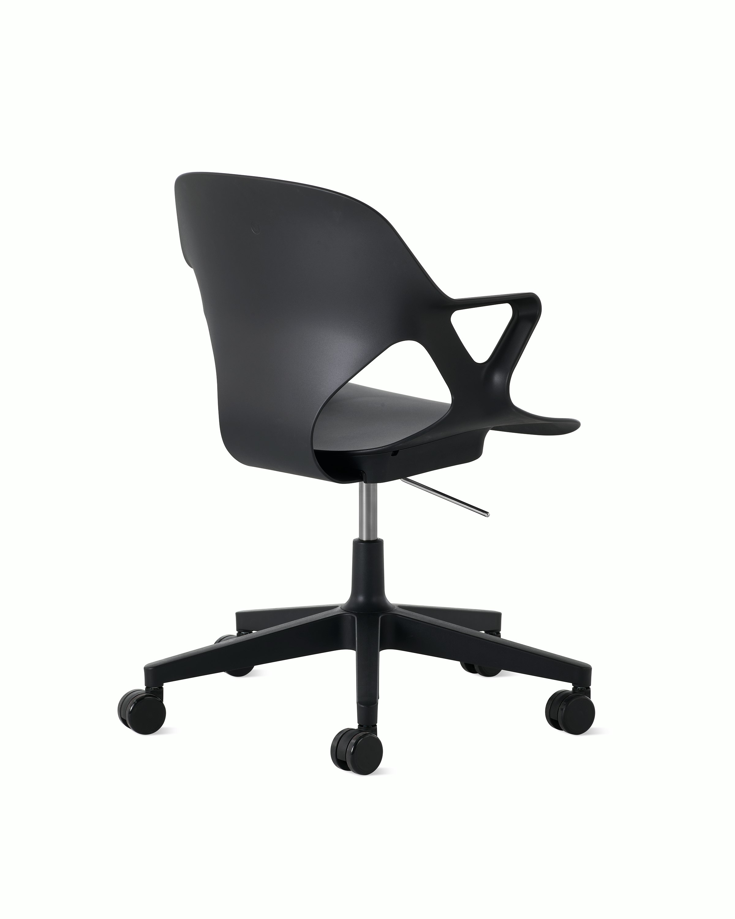Rear angle view of a Zeph chair with fixed arms in black.