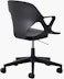 Rear angle view of a Zeph chair with fixed arms in black.