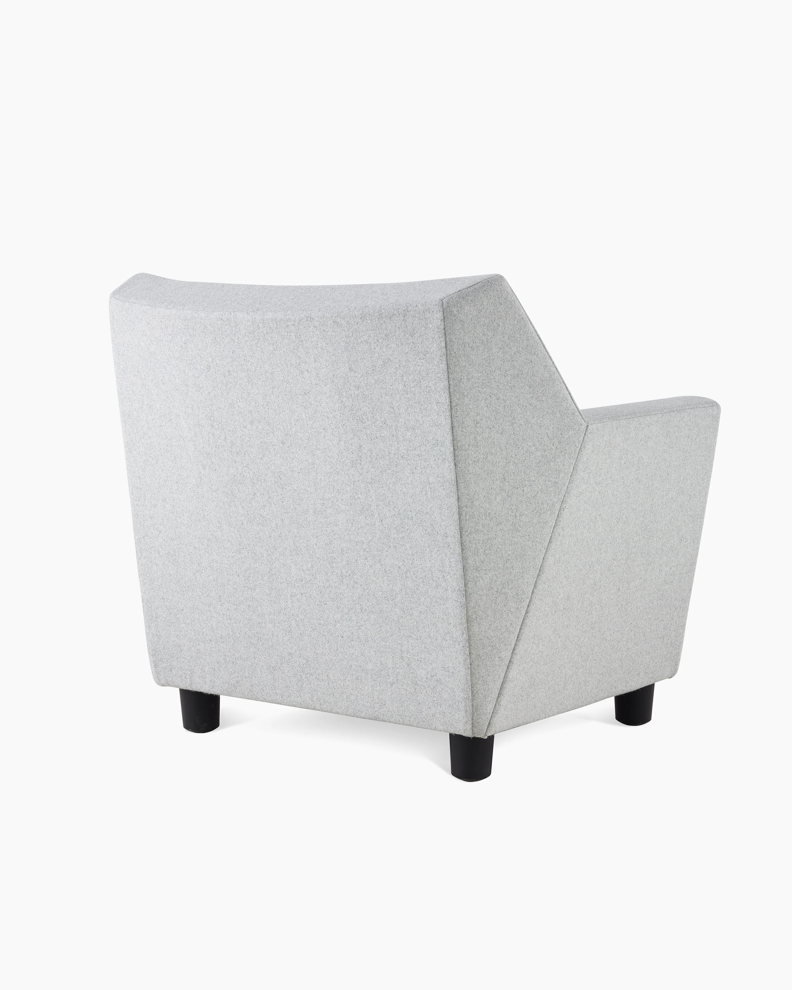 A Swoop Club Chair in light grey upholstery, viewed from the back at an angle.