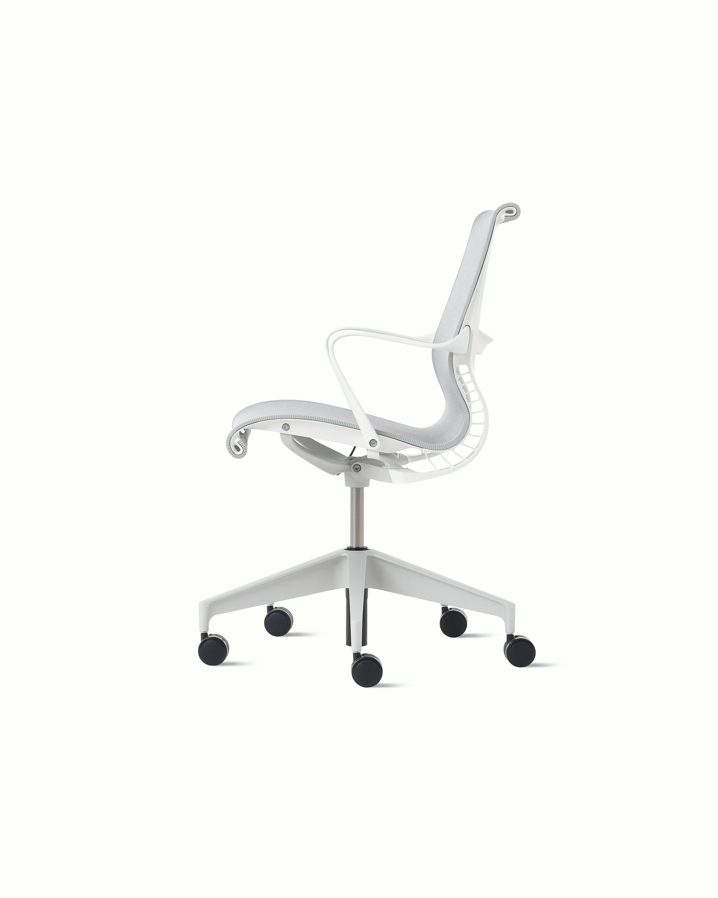 Side view of a Setu chair with grey suspension, white frame and silver alloy base.